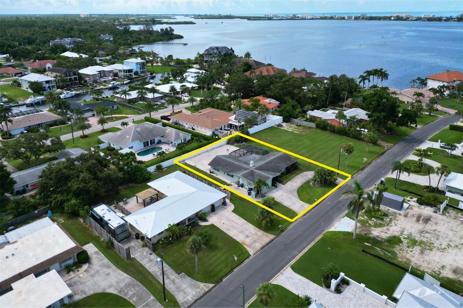 This charming and versatile 4-bedroom, 3-bathroom home offers a spacious layout and unique potential for customization or expansion. The interior flows seamlessly to a private screened-in in-ground pool—ideal for entertaining or relaxing under the Florida sun. With access to a shared community boat dock, this property is perfect as a primary residence, seasonal getaway, or income-producing rental.

1848 Southpointe Dr may be purchased individually or as part of a rare assemblage opportunity totaling 38,301 SF across three parcels. In addition to this single-family home, the assemblage includes a 1,933 SF duplex and an adjacent vacant lot—providing unmatched flexibility for redevelopment, investment, or multi-generational living.