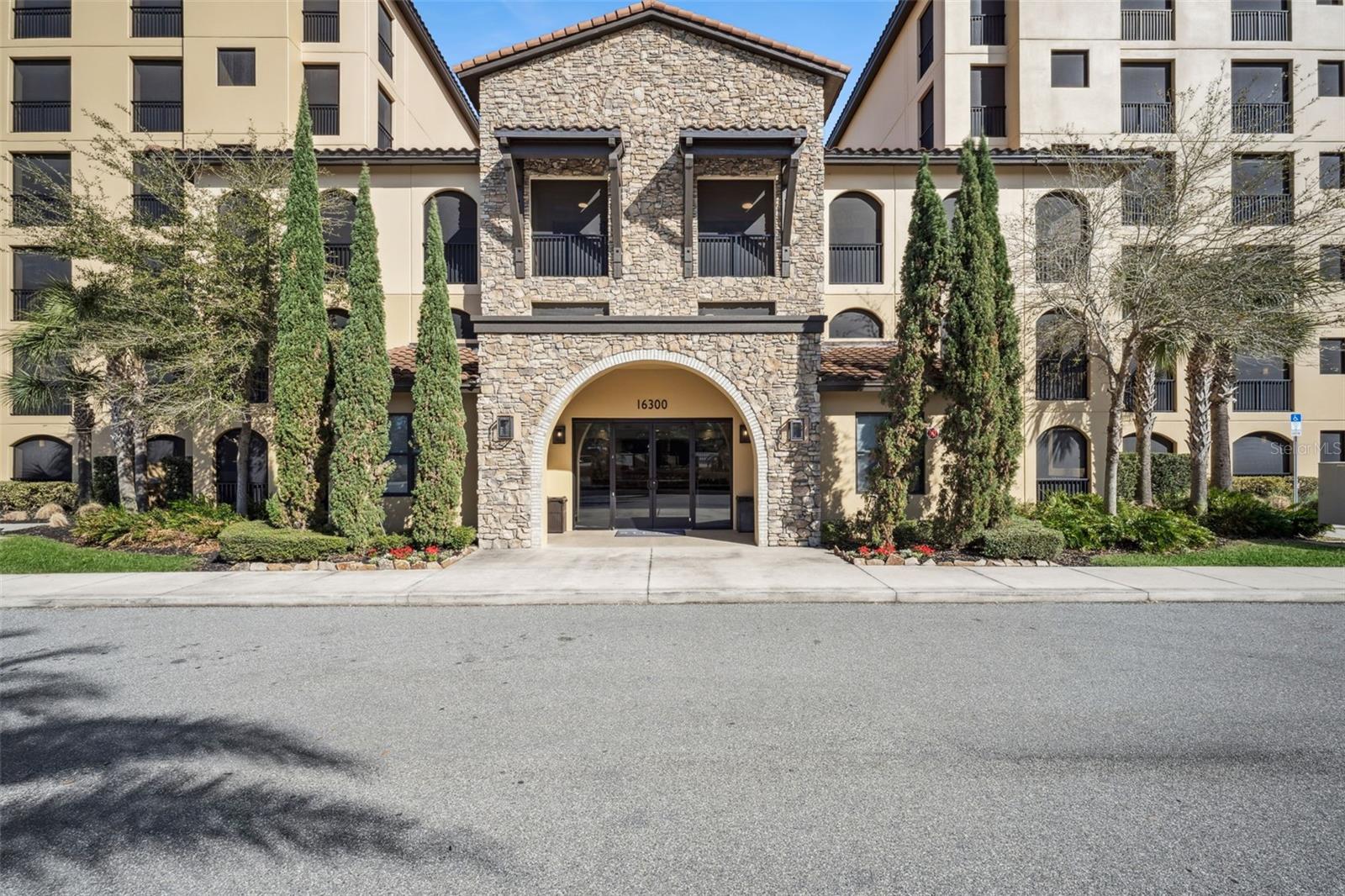 Experience the Bella Collina Lifestyle with elevated luxury & breathtaking lake views in Siena at Bella Collina. Situated on the 5th floor, this beautifully appointed 2-bedroom, 2.5-bathroom condominium offers refined living with stunning views of Lake Siena & the surrounding rolling hills.The modern, designer kitchen is both elegant & functional, featuring sleek stainless steel appliances, quartz countertops, custom cabinetry, & stylish pendant lighting—perfect for entertaining or everyday living.Wake up to tranquil water views in the luxurious primary suite, thoughtfully designed with a spa-inspired bathroom that includes dual vanities, a soaking tub, & a spacious walk-in shower. The secondary bedroom, located near the entry, offers privacy & comfort with its own en-suite bathroom, making it ideal for guests or family. A convenient powder room is centrally located off the main living area.Step outside to your private balcony overlooking Lake Siena, the perfect place to enjoy morning coffee, unwind with a glass of wine, or take in the spectacular Florida sunsets. Residents of Siena at Bella Collina enjoy an array of resort-style amenities, including a gated entrance, elegant clubhouse, state-of-the-art fitness center, conference room, cabana, resort pool, & scenic walking paths throughout the community. Ideally located just minutes from Montverde Academy, the Florida Turnpike, hospitals, and Clermont National Golf Center, this residence offers the perfect balance of luxury, convenience, and lifestyle. Discover the beauty, elegance, and serenity of Bella Collina living.