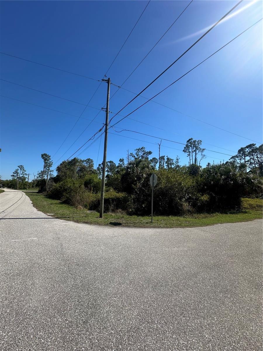 Corner Lot! This piece of property is in the BOOMING area of North Port. It is 5 minutes away from Wawa, Space Shop Storage, Burger King, Walgreens, Dominoes Pizza, 7-eleven, A car wash and even Autozone!!! This location is great for a future residence or as investment property. There is tons of new construction homes in this quiet neighborhood sitting in their own plots of land.
