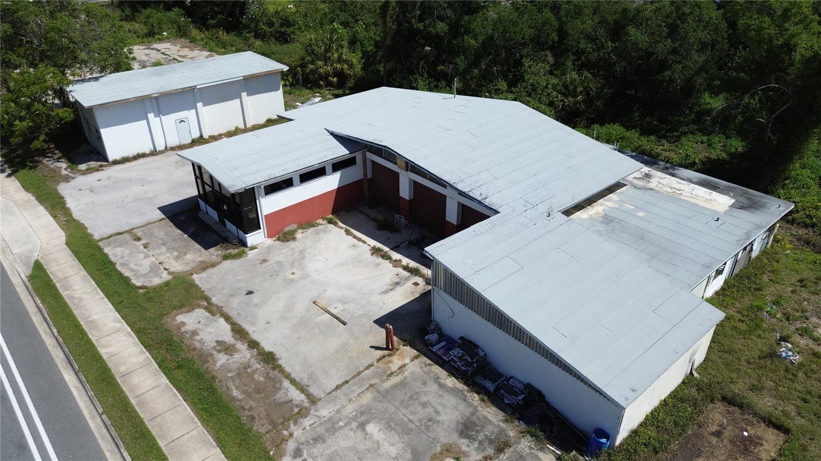 Prime Highway Frontage Commercial Property in Arcadia, FL.  Unlock incredible business potential with this high-visibility landmark site located directly on SW Highway 17. Offering massive traffic counts and exceptional divided-highway exposure, this property is perfectly suited for automotive, retail, or commercial flex use.Total Space: approx 9,439 sq. ft. across two functional structures. Features a robust block auto-mechanic/workshop building alongside a newer, high-clearance steel/storage facility.The Lot: 0.58-acre corner parcel with excellent paved accessibility, city-limit advantages, and substantial parking/yard space. Situated right on the county's primary commercial artery, offering effortless transport access for clients and fleets alike.Bring your vision to life on this high-exposure canvas. Perfect for an owner-user or an investor looking to capitalize on DeSoto County's commercial growth.
