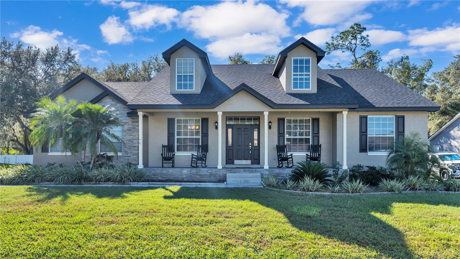 New Listing! Check out this Custom built Hulbert Home located on a cul-de-sac located in desirable South Lakeland within the Deer brooke community. This quality built 2 story pool home offers 4 bedrooms, 2 full bathrooms, half bathroom, home office, upstairs bonus room, and outdoor living space. Once you approach the home you will love the charming covered front porch! When you enter the front door you will immediately see all this home has to offer including taller ceilings, real hardwood floors, detailed trim work, and much more. The split floor plan is built for entertaining and includes a spacious kitchen with breakfast room, formal dining room, living room, bonus room, and outdoor living space. The kitchen is the heart of this home featuring quality solid wood Kraftmaid cabinets with dovetail drawers, upgraded stainless steel appliances, granite countertops, a walk-in pantry, and bar seating. The living room features a beautiful fireplace and french doors to the pool area. The primary suite features a custom tray ceiling, sliding doors to the pool, private home office room, two large walk-in closets, and a private bathroom.The 7x14 office room adjacent that is currently used for an office. This versatile space could be great also as a home gym, indoor storage, or nursery. The private ensuite bathroom is designed with a walk-in shower, an elegant soaking tub, and dual vanities with granite countertops. The huge 16x22 bonus room upstairs is perfect flex space for home theatre, play room, or 5th bedroom if needed. The outdoors were built to entertain. Unwind at the end of your day in the outdoor living space, half-bath, and beautiful pool complete with a waterfall wall.The neighborhood of Deer Brooke is conveniently located on the south side of Lakeland, close to shopping plazas, restaurants & more! You can hop on County Line Road convenient to I-4 for commuting to both Tampa and Orlando. 
Roof was replaced in 2021
***Sellers are willing to have a New AC for the upstairs bonus room installed prior to closing and provide a $3,000 credit towards new carpeting with a Full Price Offer Only. 
After you move in and add some fresh paint with your own personal touches, this house will feel brand new!  
Priced to sell quickly! Call today!