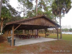 Builders Deal! Safe thousands NO well or septic needed and low connect fees to water and sewer buy 1 or all 3 lots. located in Trails East Subdivision with water and sewer. Subdivision located about 7 miles east of Silver Springs State Park. Community has several amenities see pics. Lots are cleared and permitted for 3/2/2
house call today for details.
