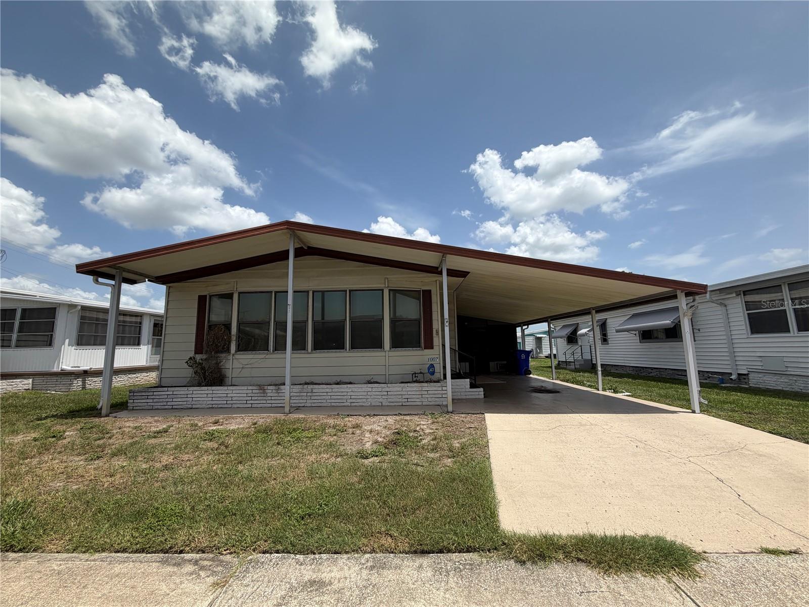 Opportunity awaits in the desirable 55+ community of Lakeside Hills Estates! This 3-bedroom, 2-bath mobile home features a spacious layout with potential for the right buyer to restore and make their own. The property is in need of significant repairs and updating, including flooring, roof, and interior ceiling repairs, and is priced accordingly.

Enjoy the many amenities this active community has to offer, including cable, internet, water, grounds maintenance, clubhouse activities, pool, and waterfront docks perfect for fishing or relaxing. Boat slips may also be available. Conveniently located near shopping, dining, medical facilities, and major roadways, this property offers the chance to enjoy the Florida lifestyle in a vibrant and welcoming community.