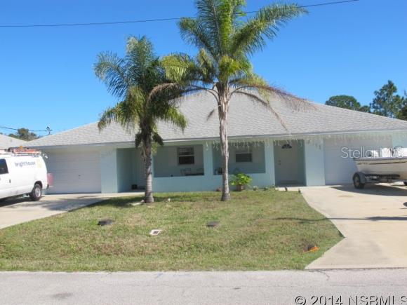 Spacious open floor plan.  Large kitchen with lots of counter space and cabinets.  Screened in back porch.  W/D hookup in garage.  Neighborhood with very little traffic. Conveniently located just West of World Famous Mosquito Lagoon fishing paradise!  This duplex provides many features that make it attractive for keeping long term tenants. ;Water: City