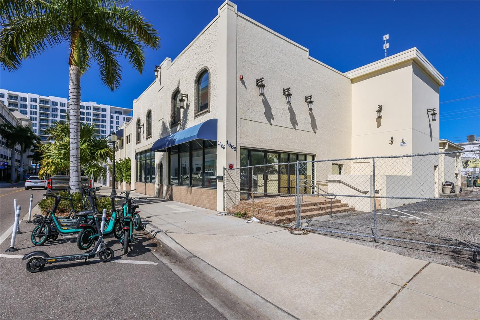 Large parcel in the heart of dowtown, with 15 on site parking paces (incredibly rare) and a city parking garage directly across the street.
The 13,000 SF building has been gutted and is ready to be finished off or re developed.  Zoning is DTC (Downtown Core) allowing 10 stories at 50 units per acre or 18 residential units.  Density Bonus: The City of Sarasota, to encourage Attainable Housing, has created an Attainable Housing Density Bonus” AHDB” entitlement option for DTC, DTB and DTE zoned properties. The AHDB offers up to 4-times the entitled residential density provided 15% of the “bonus” units are “attainable”. Base residential density for the subject is 18-units; under the AHDB the subject is entitled to 72-units provided 8-units “attainable” and 64 may be market rate. “Attainable” is defined that rent or sales price does not exceed 30% of the AMI (area medium income). Currently AMI for the City of Sarasota is approximately $80,000 per year.