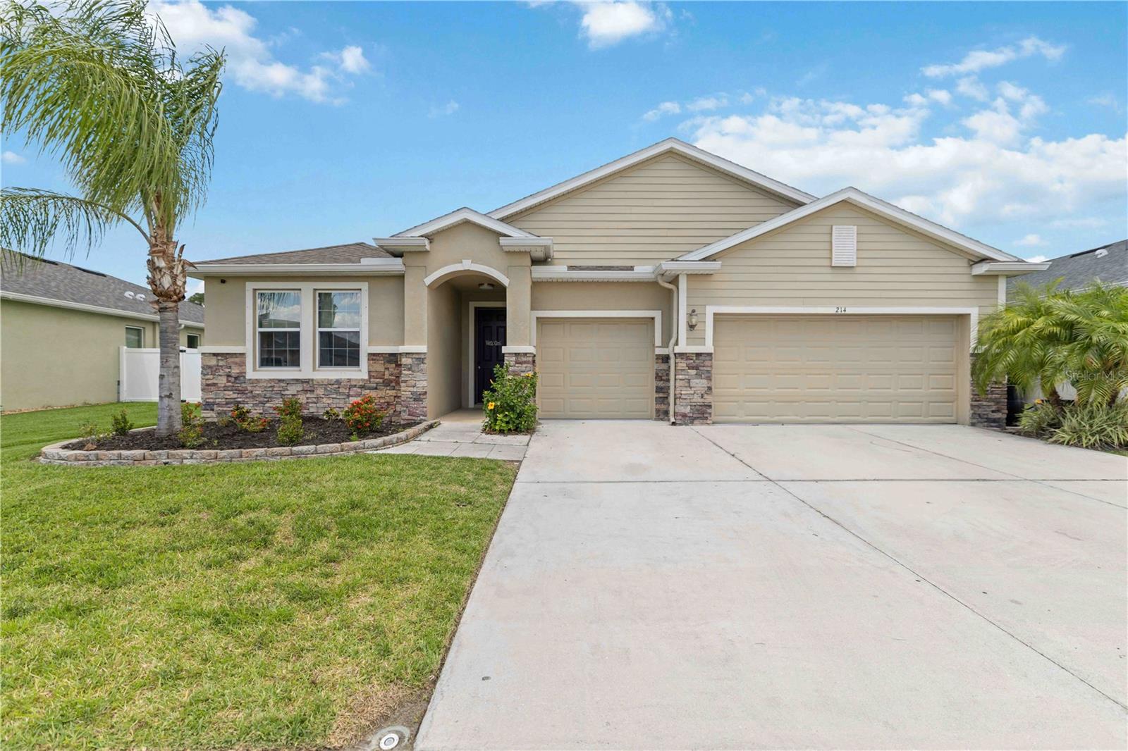 JUST REDUCED $10,000! Multi-Generational Home & NO CDD FEES with a hard-to-find OVERSIZED Private Backyard! Welcome to the highly desirable Camden model, a thoughtfully designed multi-generational home that perfectly combines space, comfort, and modern Florida living. Offering over 2,800 square feet with 4 bedrooms and 3.5 bathrooms, this exceptional residence is ideal for families seeking flexibility and functionality. Step inside to discover a bright and open floor plan featuring tile flooring throughout the main living areas, creating a seamless flow for both everyday living and entertaining. One of the home’s standout features is the spacious private multi-generational suite, offering endless possibilities as a guest retreat, home office, media room, playroom, or additional living space. This private suite includes an en-suite with a walk-in shower and a generous walk-in closet.  The primary suite serves as a relaxing retreat, complete with laminate flooring, dual vanities, a soaking tub, and a separate walk-in shower. Additional bedrooms are connected by a convenient Jack and Jill bathroom featuring both a tub and a shower, making the layout ideal for families and guests alike.  Step outside into your own fenced-in backyard oasis, where you can enjoy peaceful privacy and beautiful Florida sunsets from the expansive outdoor patio. The outdoor kitchen creates the perfect setting for entertaining family and friends year-round.  This energy-efficient home is equipped with a fully paid-off Tesla Solar Electric System along with three Tesla backup batteries, providing outstanding energy savings and peace of mind.  NO MORE high electric bills!  Additional upgrades include a water softener system, an extended outdoor patio, an under-sink reverse osmosis water filtration system, and air conditioning in the garage for added comfort and convenience.  Located in Del Tierra, a family-friendly community known for its low HOA of just $135 a month and no CDD fees, this home offers exceptional value with a strong sense of community and convenient access to everything the area has to offer. This is a rare opportunity to own a move-in-ready multi-generational home, and one of the most functional layouts available. Del Tierra residents enjoy access to a wide range of amenities, including a resort-style pool, fitness center, and playground, creating a true neighborhood feel with something for everyone. Conveniently located with easy access to I-75, shopping, dining, and top-rated schools, this home offers both everyday convenience and long-term value. Minutes to SR-64, I-75, and Ft. Hamer Bridge. Close to Gene Witt Elementary (bike ride away). Nearby shopping includes Costco, Target, Hobby Lobby, and many more! This home offers it all...huge private backyard, stylish design, tasteful upgrades, and a prime location. Don’t miss your chance to make it yours!