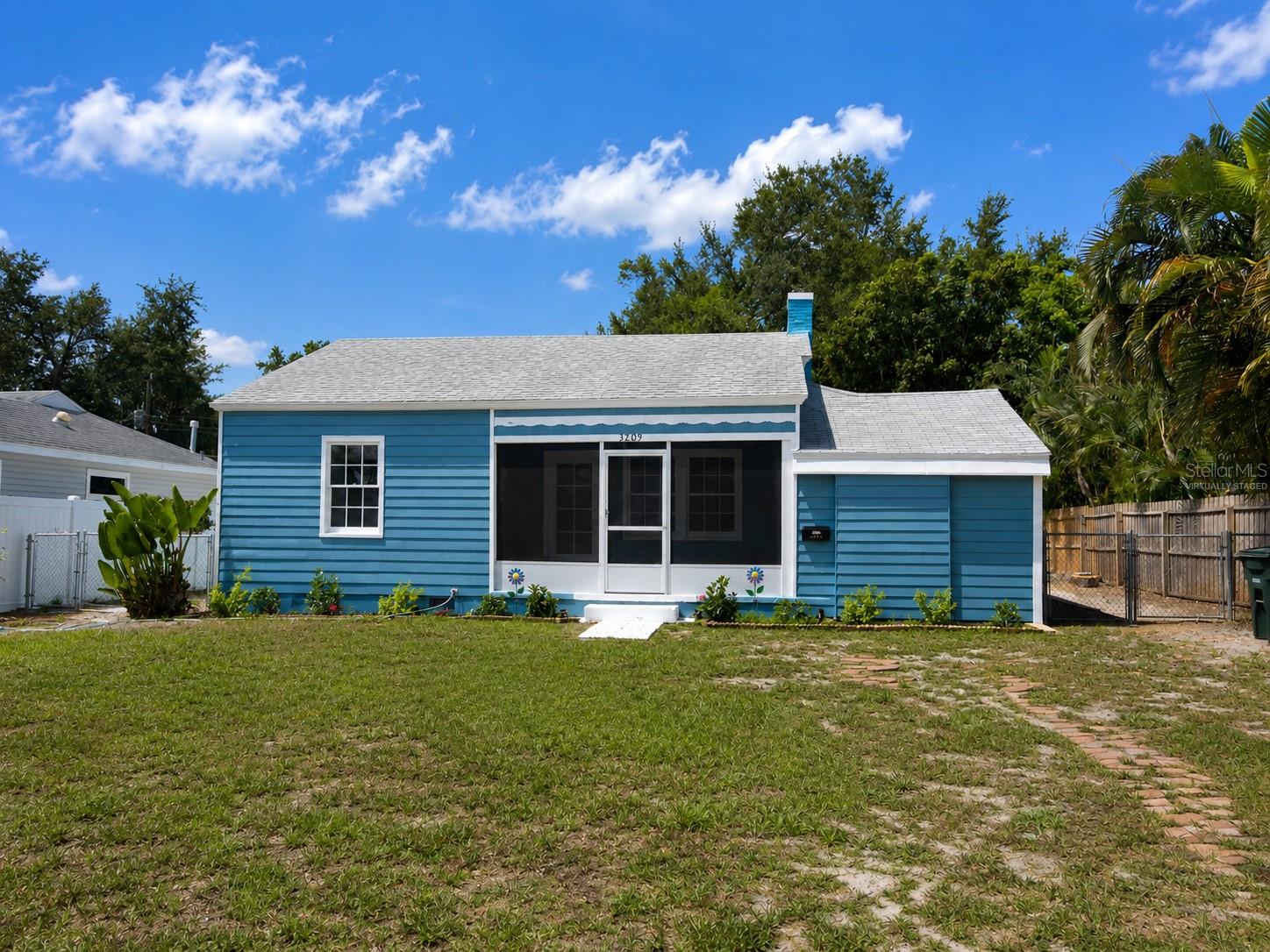 Welcome to this charming and versatile 3-bedroom, 2-bath cottage home in the heart of West Bradenton! This well-maintained residence offers a bright and functional floor plan with comfortable living spaces, abundant natural light, and a welcoming atmosphere you'll love coming home to. Cozy up on cooler evenings beside the wood-burning fireplace, adding warmth and character to the inviting living area.

A standout feature of the home is the privately situated third bedroom with its own half bath and private entrance through the screened-in front porch. Whether used as a guest suite, home office, or private retreat for a family member, this thoughtfully designed space enhances the home's functionality while remaining part of the same residence, offering added privacy and flexibility.

Step outside to enjoy the large, fully fenced backyard, complete with a storage shed and mature landscaping, providing plenty of space for entertaining, gardening, pets, or simply relaxing in your own private outdoor oasis.

Conveniently located less than one block from Lewis Park, you'll enjoy easy access to a playground, open green space, and a neighborhood park just a short stroll from your front door.

Ideally situated just minutes from Downtown Bradenton, the Riverwalk, Village of the Arts, IMG Academy, shopping, dining, medical facilities, and the beautiful Gulf beaches, including Anna Maria Island. With convenient access to Sarasota and major roadways, this home combines comfort, versatility, outdoor living, and an unbeatable location.

Don't miss this exceptional rental opportunity—schedule your private showing today!

One or more photo(s) has been virtually staged to help showcase the intended use and true potential of spaces both inside and outside of the home.