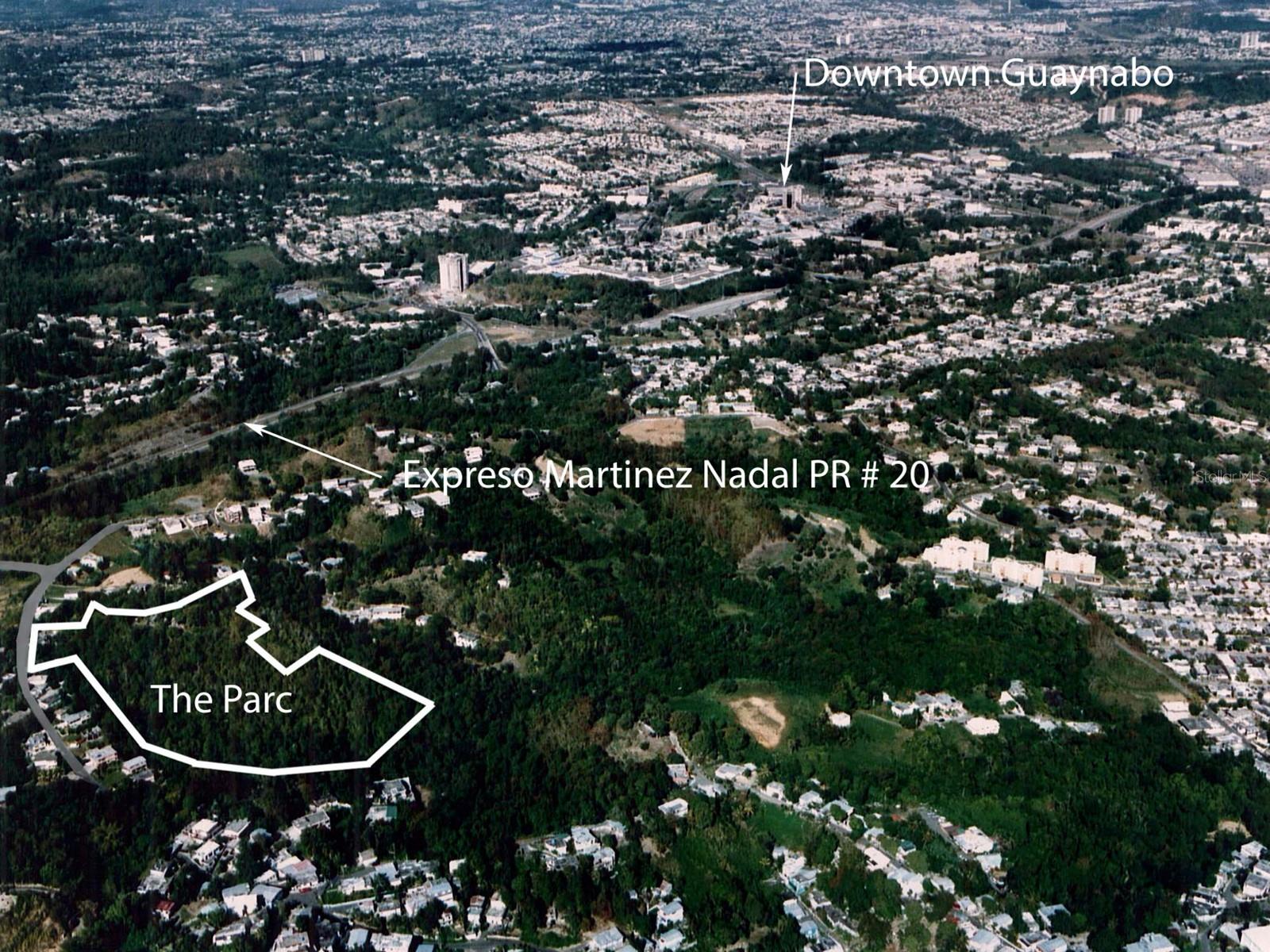 Discover a premier investment opportunity at The Parc, a 12.1-acre hillside parcel of raw land zoned for high-density residential development and previously approved for 204 multi-family units. This exceptional property offers stunning panoramic city and mountain views and is strategically located just off the Piedras Blancas exit of the Martinez Nadal expressway, providing excellent connectivity throughout the region. Only minutes from downtown Guaynabo, residents will enjoy convenient access to vibrant shopping, diverse dining, and engaging entertainment options. The site has sewer and utility access points available, significantly streamlining the development process. Surrounded by top-rated schools and suburban neighborhoods, The Parc blends urban convenience with natural beauty, making it an ideal location for a landmark residential community. Contact us today to explore this outstanding development opportunity.