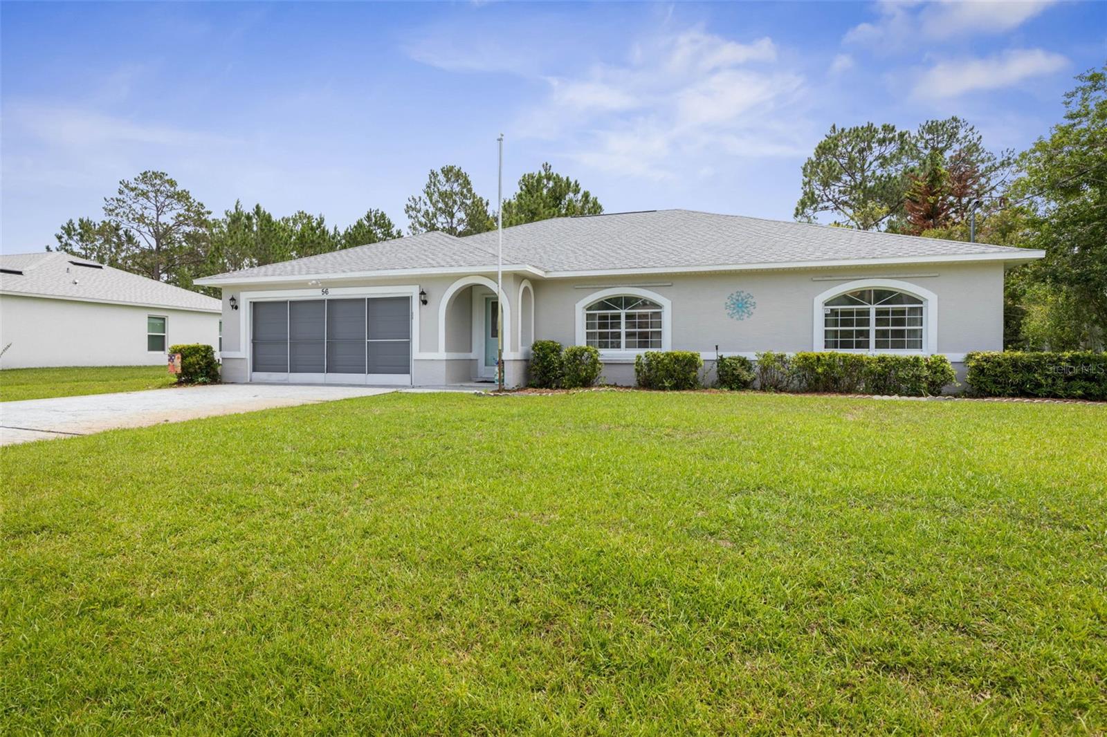 Welcome to this beautifully updated 3-bedroom, 2-bath home offering 1,865 square feet of comfortable living space in the heart of Palm Coast. Move-in ready and thoughtfully refreshed, this home features a new roof (February 2025), fresh interior and exterior paint including the garage floor, new wall-to-wall flooring, and numerous modern upgrades throughout. The spacious open floor plan is enhanced by vaulted and tray ceilings, creating a bright and inviting atmosphere.

The updated kitchen showcases elegant quartz countertops, modern appliances, and ample space for cooking and entertaining. The primary suite offers a generous layout with a walk-in closet, dual vanities, and a walk-in shower. Additional improvements include an updated bathroom vanities and lighting, new ceiling fans in the bedrooms, garage, and lanai, a new garage door, new sliding garage door screens, and newly replaced lanai screens.

Enjoy Florida living year-round from the spacious screened lanai overlooking a private, partially fenced backyard that provides added privacy and space for pets, gardening, or outdoor enjoyment. Additional features include hurricane shutters, an irrigation system, storage shed, public utilities, and a spacious two-car garage.

Conveniently located just minutes from the Southern Recreation Center, one of Palm Coast's premier recreational destinations offering tennis courts, pickleball courts, fitness programs, walking trails, and community activities. You'll also enjoy easy access to shopping, dining, schools, golf courses, medical facilities, hospitals, and Flagler Beach, making everyday living both convenient and enjoyable.

Beautifully maintained and extensively updated, this home offers the perfect combination of comfort, style, location, and value. Whether you're looking for a primary residence, seasonal retreat, or investment opportunity, this move-in-ready property is one you won't want to miss.