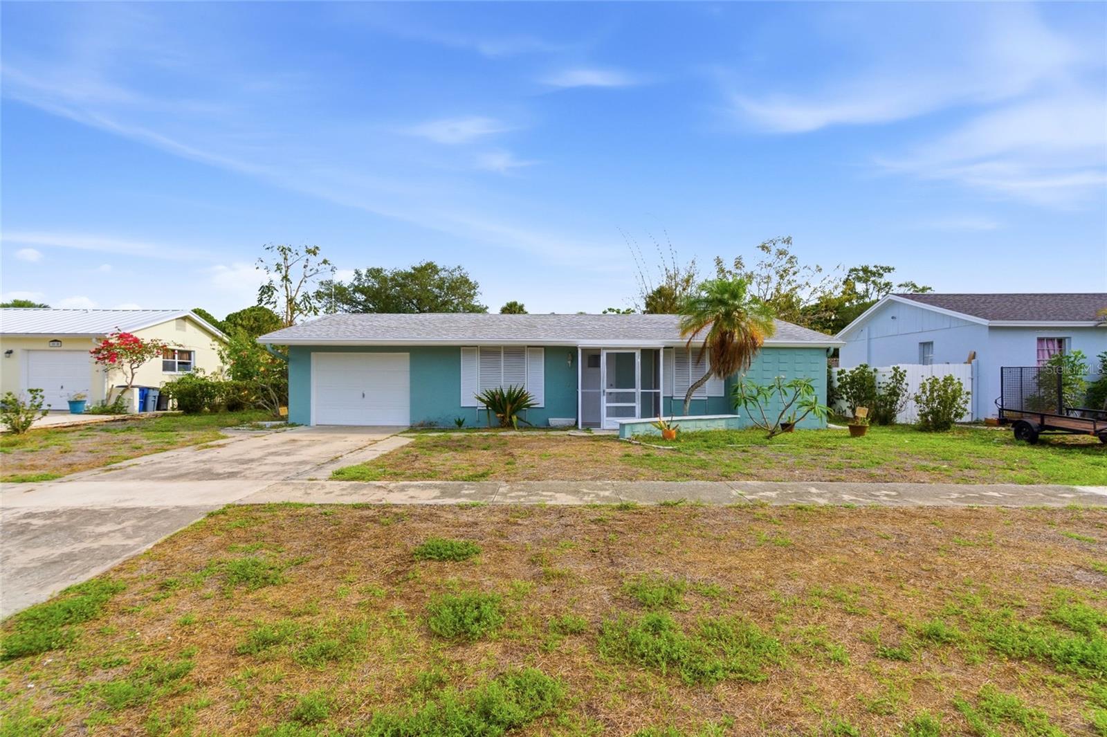 Welcome to this charming 2-bedroom, 2-bath home located in the desirable Ridgeway Estates community of North Fort Myers. Offering 1,048 sq ft of comfortable living space, with classic Florida charm. The spacious primary suite features a walk-in closet and private bath, while the inviting foyer includes a convenient tech/work area. Terrazzo flooring runs throughout the home, adding both durability and character. The kitchen is equipped with a stainless-steel refrigerator and dishwasher and flows seamlessly into the dining and living areas—ideal for everyday living and entertaining. Enjoy indoor-outdoor living with impact sliding glass doors off the kitchen/dining area and a pocket slider from the primary bedroom leading to the screened porch. Recent updates provide peace of mind, including a roof installed in 2019, all impact windows and doors installed in 2024, and a newer water heater. Conveniently located near shopping, dining, and major roadways, this move-in-ready home in Ridgeway Estates is a fantastic opportunity—schedule your showing today!