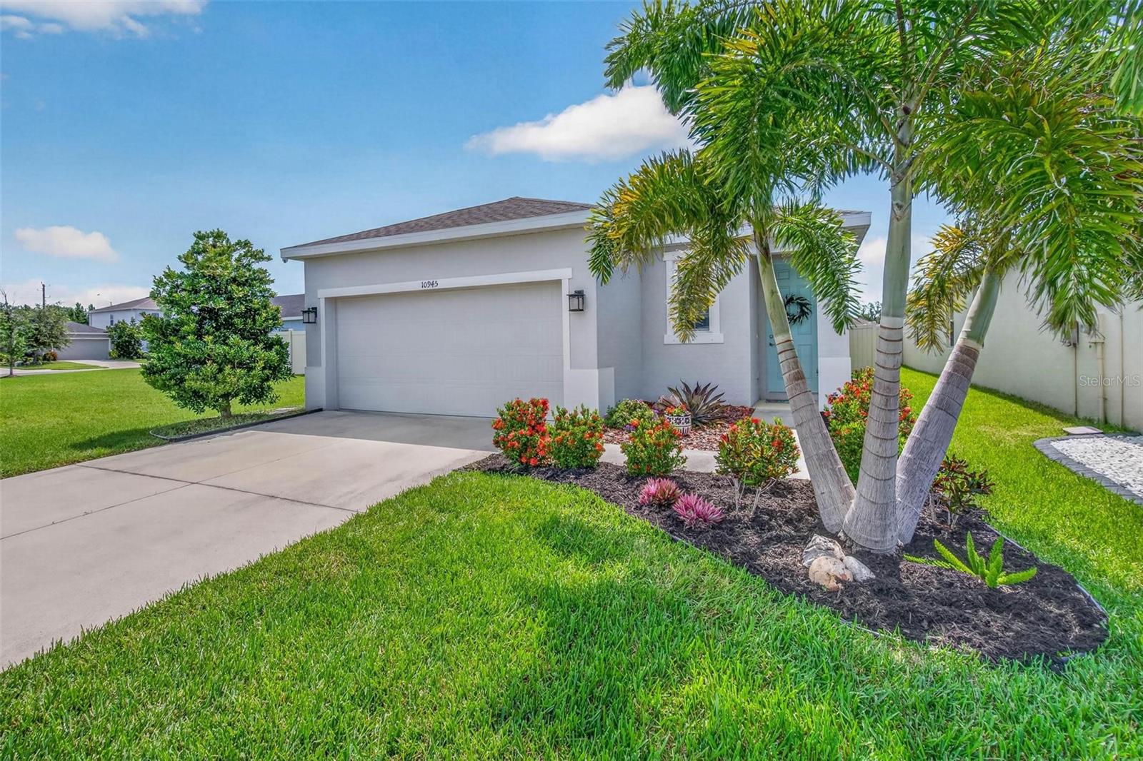 Imagine a lifestyle where modern comfort, outdoor living, and resort-style amenities come together in one beautiful home. Nestled in one of Parrish's most desirable communities, this beautifully maintained three-bedroom, two-bath residence offers the perfect setting for enjoying everything Florida living has to offer. Built just five years ago and located in a non-flood zone, this move-in-ready home welcomes you with an open-concept design ideal for both everyday living and entertaining. Tile flooring flows throughout the main living areas, while the bedrooms offer the warmth and comfort of plush carpeting. At the heart of the home, the stylish kitchen features granite countertops, a large center island, and newer LG appliances, creating a space where family and friends naturally gather. The adjoining dining and great room areas provide seamless flow for hosting celebrations or enjoying quiet evenings at home. The spacious owner's retreat offers a private sanctuary with a large walk-in closet and a well-appointed bath featuring dual vanities and a private water closet. Two additional bedrooms provide flexibility for guests, a home office, fitness space, or hobbies. The true highlight of this home is the Florida lifestyle waiting just outside your back door. A newly added screened lanai creates the perfect outdoor living room where you can enjoy morning coffee, evening cocktails, weekend barbecues, or simply relax while overlooking the expansive fenced backyard. With plenty of room for pets to roam, children to play, or even the addition of a future pool, the backyard offers endless possibilities for outdoor enjoyment and privacy. Additional features include hurricane shutters, an LG washer and dryer, and a gated backyard entry for added convenience. Beyond the home, residents enjoy access to an amenity-rich community featuring a clubhouse, resort-style pool, playground, dog park, and scenic sidewalks perfect for evening strolls, morning walks, or meeting neighbors. Whether you're seeking relaxation, recreation, or a vibrant sense of community, this exceptional Parrish home delivers the Florida lifestyle you've been dreaming of.