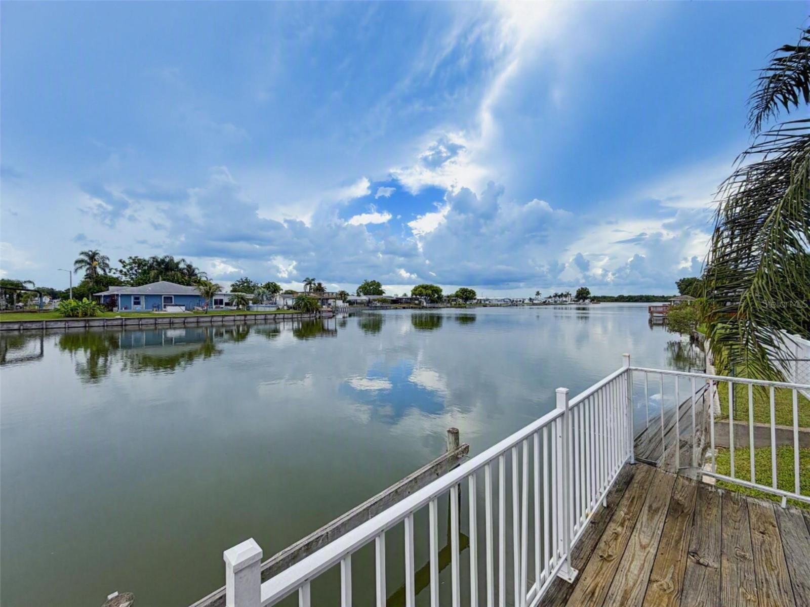WATERFRONT LIVING on beautiful Lake Conley with access to Lake Nash, this 2-bedroom home offers a
relaxing backyard setting with a seawall, dock, water views, and the opportunity to enjoy Florida
wildlife right from your own property. Whether you’re sipping coffee by the water, fishing from the
dock, launching a kayak, or winding down at sunset, this home delivers the lifestyle so many buyers are
searching for. According to the seller, the home did not flood during the recent hurricanes, adding
extra peace of mind for buyers looking for waterfront living. Inside, you’ll find a comfortable, updated
home with easy everyday living. Even better, there are no HOA or CDD fees, and this property QUALIFIES
FOR A NO MONEY DOWN PURCHASE OPTION FOR ELIGIBLE BUYERS. The location is close to parks, shopping,
dining, and everyday conveniences, with nearby access to Anclote River Park, Key Vista Nature Park, Fred
Howard Beach, the Tarpon Springs Sponge Docks, and downtown New Port Richey Main Street Dining. With
US-19 just minutes away, Tampa International Airport, and some of Florida’s world-renowned white-sandy
Gulf beaches, including Honeymoon Island, Caladesi Island, and Clearwater Beach. All are within easy
reach. From quiet mornings on the lake to weekends at the beach, this home brings together the
relaxation, recreation, and convenience that make Florida living so special. Schedule your private
showing today