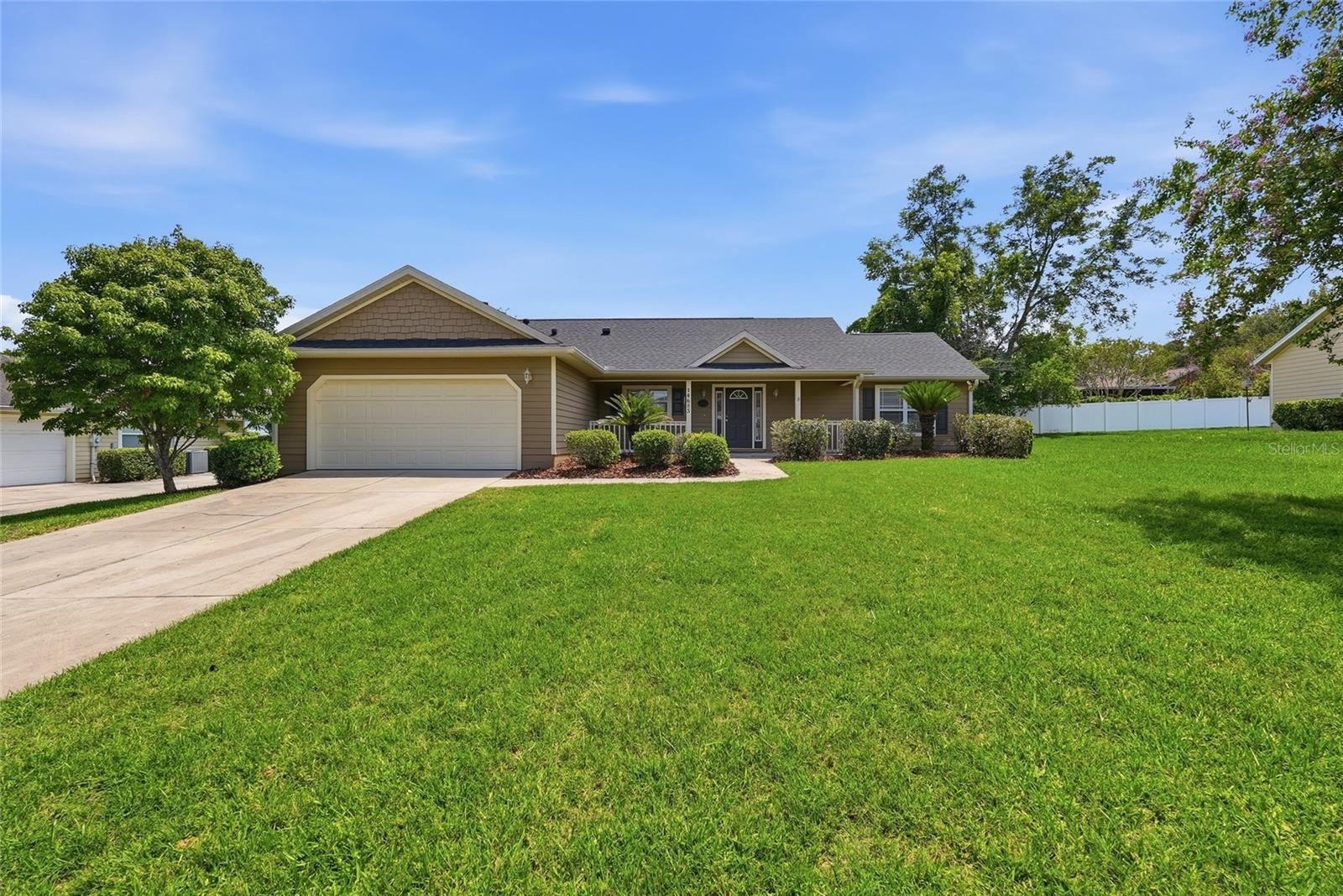 Walkable living in the heart of downtown Alachua. Looking for a turn key, move in ready home walking distance to boutique shopping, restaurants, gyms, parks, and the grocery store? You found it! This beautifully remodeled home offers extensive improvements like a brand new roof, new hot water heater, new (never used) stainless appliances, new LVP flooring, new quartz counter tops, and fresh interior paint. As you walk in you’re greeted by soaring vaulted ceilings, and walls of windows, filling the home with natural light. To your left is the kitchen and island with seating for 4, over looking the spacious living and dining room. Past the living room is the private primary retreat- complete with raised tray ceilings, a massive walk in closet, and en suite bath with a walk in shower, linen closet, and separate vanities on either side of the jetted tub. On the opposite side of the home, you’ll find two well appointed bedrooms, an immaculate guest bathroom, and an oversized laundry room leading you to the two car garage. Homes rarely come available in this extremely sought after community, and this is one of the most updated homes to hit the market in many years. Schedule your showing today!