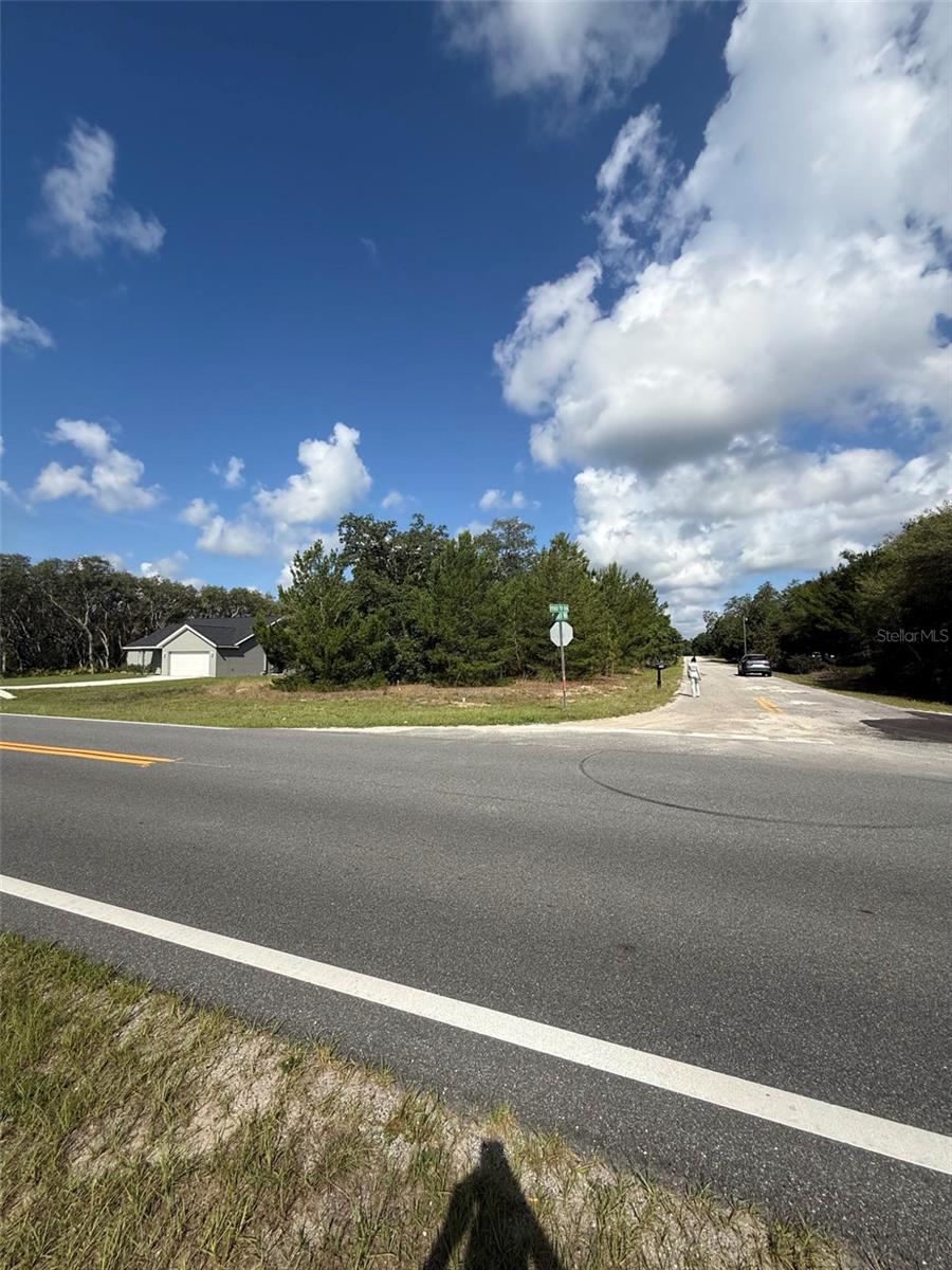 Vacant land located at the corner of Fisher Ter Run and Fisher Rd in Ocklawaha. This .23-acre corner lot is zoned R-1 with no HOA. Public water and sewer nearby. Ready for your new custom home.