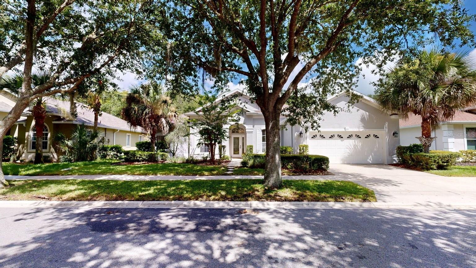 Welcome to your new home in Grand Haven, one of Palm Coast’s most sought-after gated communities. Over 2500 sq t. of finished living space, thoughtful and functional layout. The spacious kitchen features new granite counters, ample prep and cooking space along with a large pantry.  Perfect for entertaining guests or just hanging out with family as this kitchen looks over one of the family rooms with beautiful marble tile and gas fireplace.  Marble tile continues throughout the main living areas adding value and a European touch! The primary suite features two walk-in closets and a large bath. There is an Additional bedroom next to primary suite that would be perfect for an office or a guest room.  The other 2 bedrooms are conveniently on the other side of the home.  The huge fully screened lanai is an entertainer’s dream with an outdoor kitchen, hot tub, sauna, and so much space for lounging.  Grand Haven boosts 2 heated pools, 2 fitness centers, tennis, pickleball, and basketball courts. Don’t forget the village café boasting amazing food and drinks.  Enjoy walking trails, amazing Live Oak trees that look like a picture, and the privacy plus security of a gated community with a 24 guard. Low HOA and CDD fees, and an opportunity to join Grand Haven Golf Club as a social member or get a full golf membership at this beautiful Jack Nicklaus designed luxury course.  Welcome home!!