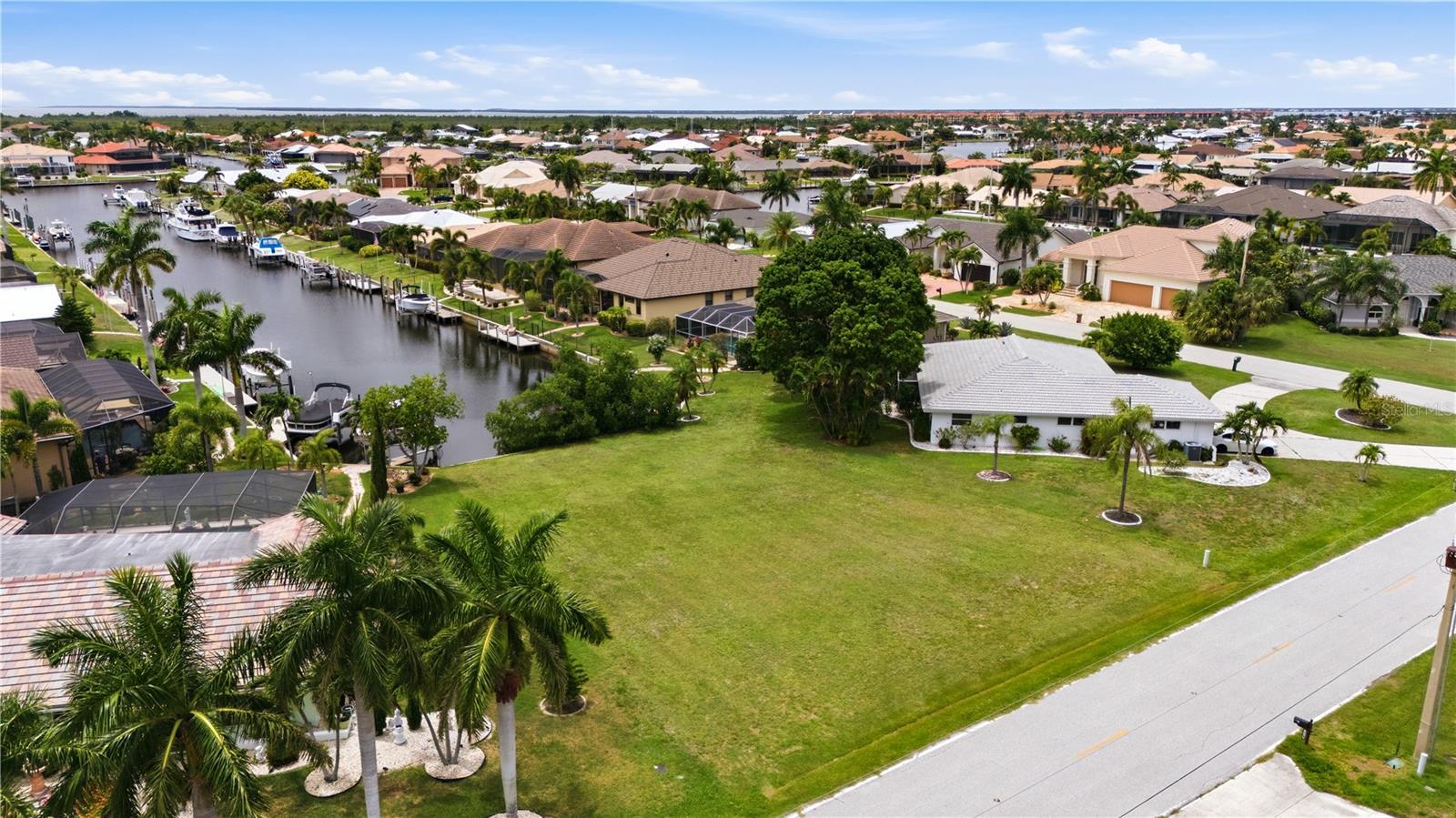 Build your Southwest Florida dream home on this oversized sailboat waterfront lot in the highly desirable Punta Gorda Isles community. Offering canal frontage with access to Charlotte Harbor and the Gulf of Mexico, this exceptional homesite provides the perfect setting for boating, fishing, and enjoying the Florida lifestyle. The generous lot size offers added flexibility for home design, outdoor living spaces, and a pool. Conveniently located near historic downtown Punta Gorda, waterfront parks, golf courses, shopping, dining, entertainment, and I-75. Enjoy beautiful water views, spectacular sunsets, and all that Punta Gorda Isles has to offer. Don't miss this opportunity to own a premium oversized canal-front property in one of Southwest Florida's most sought-after waterfront communities. Start Living the Florida Lifestyle!!