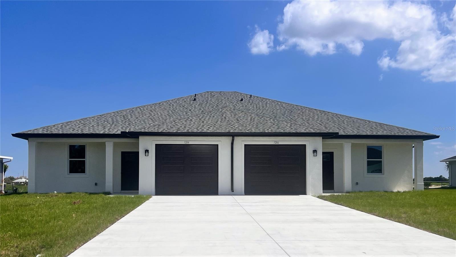 Turnkey Investment. Zero Guesswork. Day-One Cash Flow.
Welcome to this new construction duplex — fully rented, transferable warranties, and built to outperform. Located where East Englewood meets Port Charlotte, just 8 miles from the beach and 6 miles to access the Myakka River, this compelling income property backs up to the public Cove of Rotonda Golf Center, delivering the kind of permanent, unobstructed view that tenants pay a premium to keep.
Each 1,323 sq ft residence offers 3 bedrooms, 2 full baths, a single-car garage, and a screened lanai overlooking the golf course. The primary suite features a walk-in closet and walk-in shower. Kitchens are appointed with stainless steel appliances, granite counters, and white cabinetry.  The homes are open-concept layouts finished to a standard that attracts and retains quality residents.
Built for durability and long-term low cost of ownership: concrete block construction, hurricane impact windows and doors throughout, no HOA, no CDD, and current insurance is just $2,700/year for the entire building. The property is also located in Flood Zone X, requiring no flood insurance.
Both units are leased at $1,850/month through April under annual agreements — that's $44,400 in gross annual income from day one, with no lease-up risk and no vacancy to absorb. Residents cover all utilities and lawncare.
Construction and appliance warranties are in place and transfer to the buyer, meaning you're acquiring a truly set-it-and-forget-it asset.
No flood insurance. No community fees. No deferred maintenance. Just a beautiful home on a golf course that pays you back.