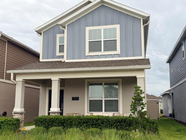 Welcome to this beautifully designed 4-bedroom, 3-bath rental home in sought-after Tohoqua, Kissimmee. This spacious two-story floor plan offers over 2,000 square feet of living space with ceramic tile throughout the main areas and soft carpet in all bedrooms. The open kitchen features sleek stone countertops, a full suite of appliances, generous cabinet space, and a seamless flow into the living and dining areas. Downstairs, you’ll find a private bedroom and full bath, ideal for guests or a home office. Upstairs includes a versatile loft with built-in desk, two additional bedrooms, a full bath, and a convenient laundry room. The owner’s suite is a true retreat with a private en-suite bath, dual sinks, a glass-enclosed shower, and ample closet space. Just inside the back entry, a mudroom with another built-in desk adds everyday function. Step out to a covered, screened-in patio with brick pavers that connect to a detached 2-car garage. The fully fenced backyard adds privacy and low-maintenance turf on both sides keep things tidy year-round. Out front, enjoy peaceful park-like green space. Community amenities shine with a resort pool, splash pad, tennis courts, picnic pavilions and playgrounds all set between Lake Toho and East Lake Toho. Minutes from the Florida Turnpike, The Loop, and Lakefront Park, this home keeps you close to Gatorland and all the dining, shopping, and recreation in Kissimmee and St. Cloud. Modern comfort, smart design, and prime location, all in one place.