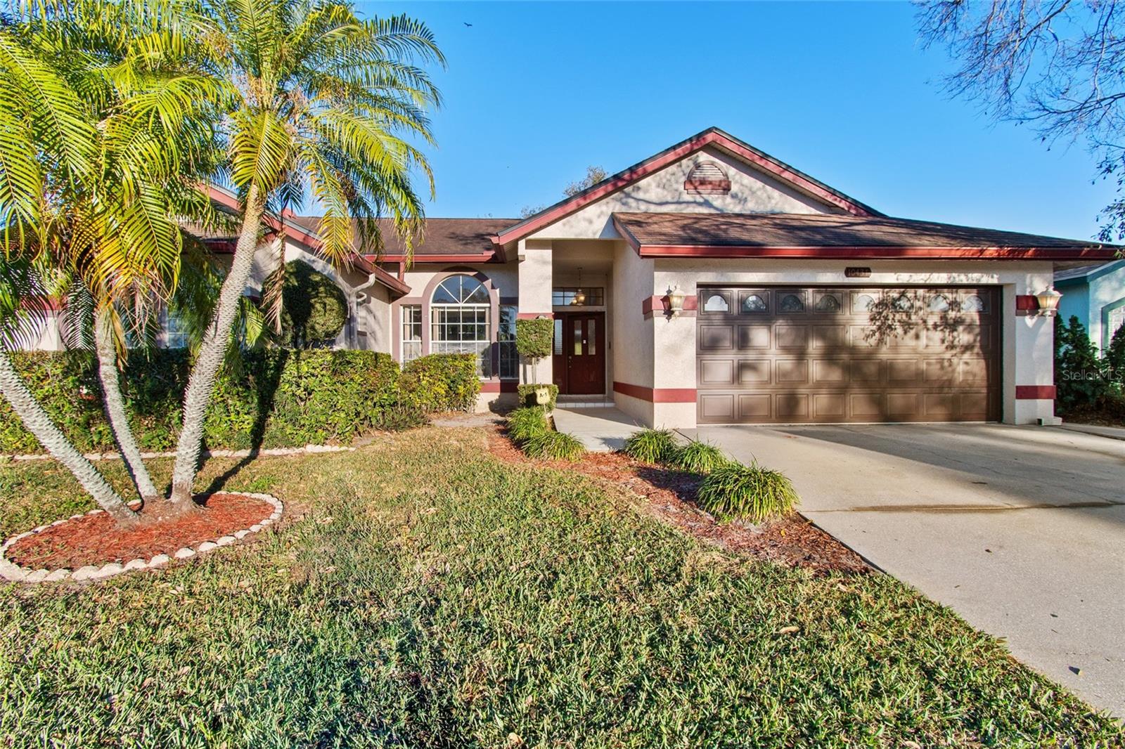 Discover this spacious 3-bedroom, 2-bathroom pool home with a 2-car garage, conveniently located in the heart of Pinellas County, just minutes from Tampa Bay's beaches, shopping, dining, airports, and major attractions. Offering 1,903 heated square feet of living space, this well-maintained residence combines comfort, functionality, and beautiful waterfront views.
The bright and airy floor plan is filled with natural light, highlighted by large sliding glass doors that open to a screened-in pool and lanai area, creating the perfect space for entertaining or relaxing. The fully fenced backyard overlooks a peaceful lake, providing a private and scenic setting.
Designed with a desirable split-bedroom layout, the spacious primary suite is separated from the secondary bedrooms and features a large walk-in closet and private en-suite bathroom. The family room offers soaring cathedral ceilings, a decorative fireplace, and numerous windows that enhance the home's warm and inviting atmosphere.
The kitchen provides ample cabinet and counter space, a convenient serving counter, and a sunny breakfast nook that overlooks the family room, making it ideal for everyday living and casual gatherings.
For added peace of mind, a Home Shield Home Warranty is included with the lease. Tenants simply contact Home Shield for covered appliance repairs and pay a $125 service call fee. Rent includes pool maintenance and lawn care.
Requirements include first month's rent, last month's rent, security deposit, background check, income verification, and Renter's Insurance. No smoking permitted.