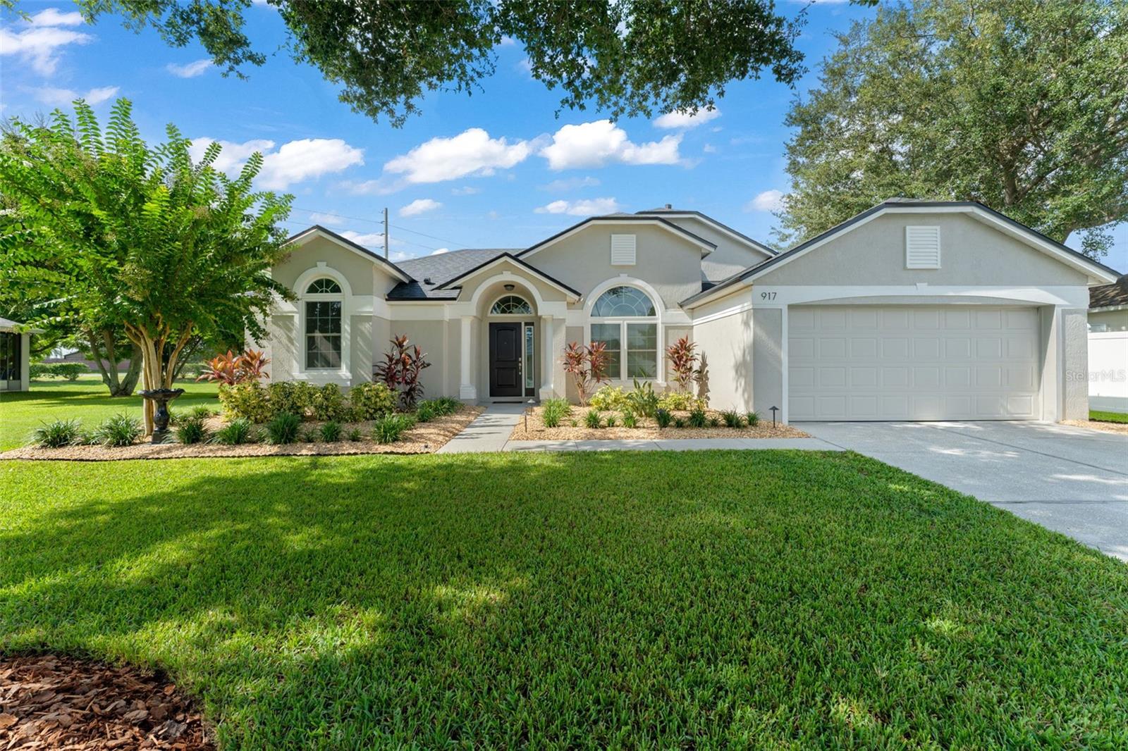 **This house comes with a REDUCED RATE through the seller's preferred lender. This is a lender-paid rate buydown that reduces the buyer's interest rate and monthly payment.**
This home has been thoughtfully updated with quality improvements that provide both style and peace of mind. A new roof installed in 2025 comes with a 10-year transferable warranty. The kitchen was beautifully renovated in 2024 with premium Cambria quartz countertops, and both bathrooms have been tastefully updated with modern finishes. The garage door system and springs were replaced in 2024 with a professional-grade Genie opener. In 2023, the landscaping was refreshed, irrigation valves were replaced, and electrical outlets and switches were modernized. For enhanced efficiency and comfort, energy-efficient, noise-reducing windows and a new front door were installed in 2022.

Step inside to a thoughtfully designed split-bedroom floor plan that offers both privacy and functionality. The light-filled family room welcomes you upon entry, setting the tone for the rest of the home. Just off the foyer is the spacious primary suite, a true retreat featuring French doors that open to the backyard patio, a beautifully updated ensuite bathroom with a step-in soaking tub, a floor-to-ceiling tiled walk-in shower, a dual sink vanity, and a generous walk-in closet.

To the right of the entry, you will find a formal dining room, currently used as a home office, offering the flexibility to fit your lifestyle. Continue to the heart of the home where the kitchen and breakfast nook overlook the serene backyard. The kitchen features white cabinetry with crown molding, premium Cambria quartz countertops, stainless steel appliances, and a breakfast bar that is perfect for casual dining or entertaining. Adjacent to the kitchen, the family room is filled with natural light thanks to wood-framed French doors that open to the patio.

Two additional bedrooms with built-in closets are privately situated on the opposite side of the home and share a beautifully updated full bathroom with a tub and shower combination, making this layout ideal for family or guests. The laundry room includes overhead cabinetry and provides convenient access to the garage.

Step outside to your own private oasis. A fully paved patio with a built-in fire pit overlooks the fully fenced backyard, offering endless possibilities for gardening, entertaining, or creating the outdoor space of your dreams. Whether you're relaxing beneath the shade tree in the front yard or gathering around the fire pit with family and friends, 917 Via Bianca is more than just a house. It is a place to truly feel at home and create lasting memories.