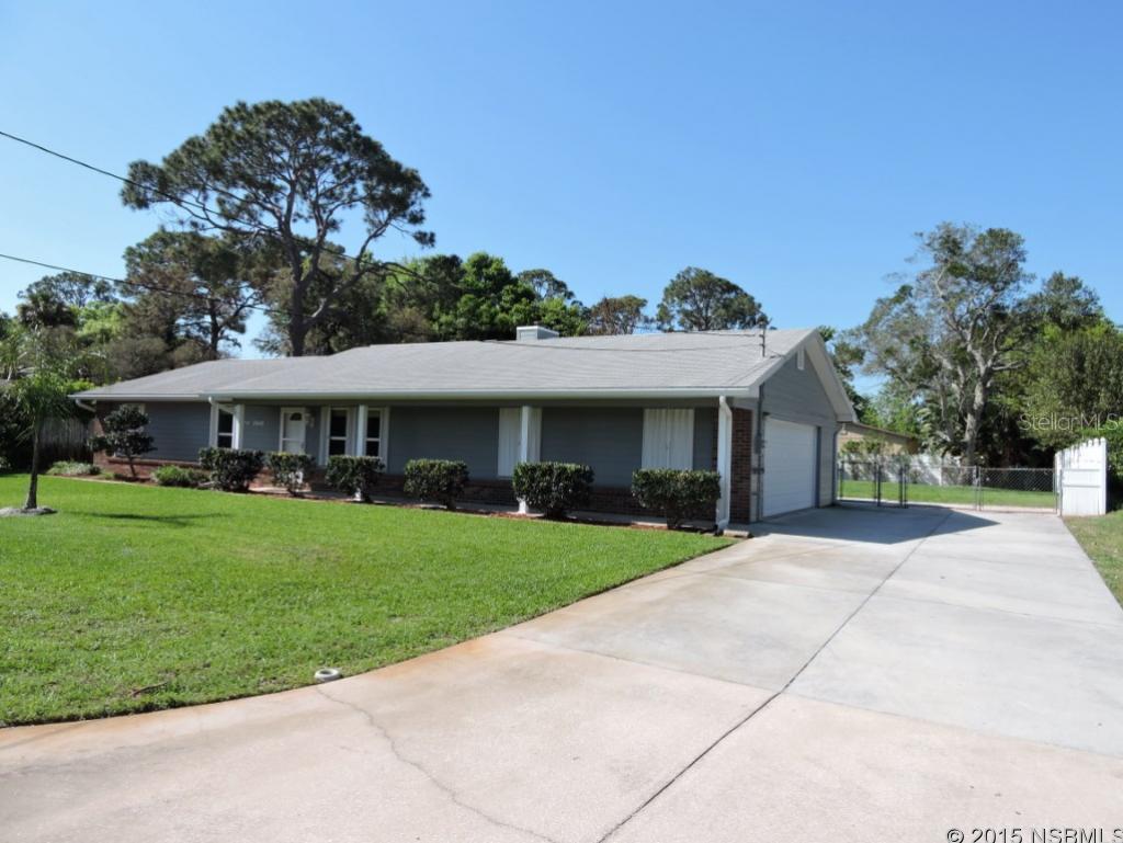 Bring your kids, the dog and your big boy toys - lots of elbow room for everyone to enjoy this great family home sitting on 100 x 150 foot privacy fenced lot with drive-thru gate and long concrete driveway.  Plenty of room to add a pool.  Home is beautifully maintained and upgraded with new kitchen wood cabinets and matching island that is movable, hard-surface counters and new appliances all in 2009. Both bathrooms are updated.  13 Seer A/C system and new Pella vinyl, double pane windows both in 2008. Accordion storm shutters and Hardiboard siding  and brick exterior. Natural Gas tankless water heater and stove. All wood laminate or tile floors, fireplace in living room, 200 amp service, and oversized 27 foot wide garage. Nice 8 x 12 storage building is anchored, but can be relocated. 14 x 47 concrete patio is ready for expansion, as built with that intention, with 16 x 16 footers, ready to accommodate family room, 19 feet of this patio is under cover. Sprinkler system with well. Lots to like, great price. ;Water: City