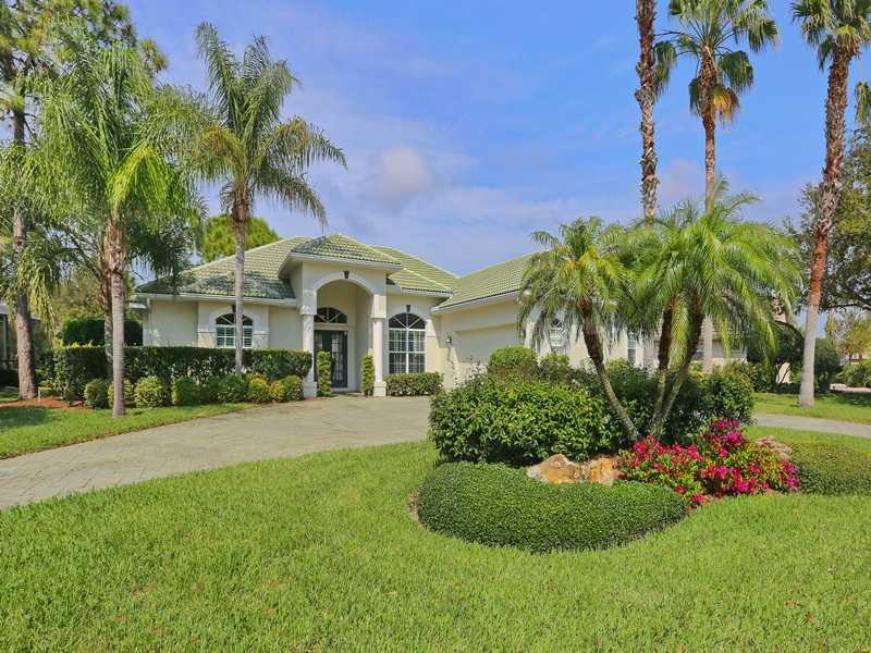 YOU WILL KNOW THIS IS A VERY SPECIAL COMMUNITY WHEN YOU ENTER CALUSA LAKES. With it's 2 large waterfalls,  winding streets, large trees and mature landscaping. Pride of ownership shows in this 3 bedroom, 2.5 bath home. Spacious open floor plan. Pocket sliding glass doors in the great room with wide vista views of the lake and golf course. Formal dining room. Kitchen features raised panel step cabinets with crown molding on top, planning desk and wine rack. Large aquarium window in morning room. Owner hascustomized this floor plan so the 3rd bedroom can also be used as an office. This bedroom/office has the 1/2 bath that also opens to the pool. Master bedroom has sitting area and 2 walk-in closets. Master bath features two vanities, dressing table, Romanshower and private commode area. Stamp-Crete design on large lanai and pool deck. Outside kitchen with sink and refrigerator. The heated pool & spa has a wonderful private lake and golf course view. Over sized side load 2 car garage with storage cabinetsand work bench. Stamp-Crete design on circular drive way. Calusa Lakes is a semi-private golf course community. You do not have to join to play golf or enjoy the club house. Great location close to beaches, shopping, churches, great restaurants and the Legacy bike and hiking trail. ALL FURNITURE IS AVAILABLE FOR EXTRA $$