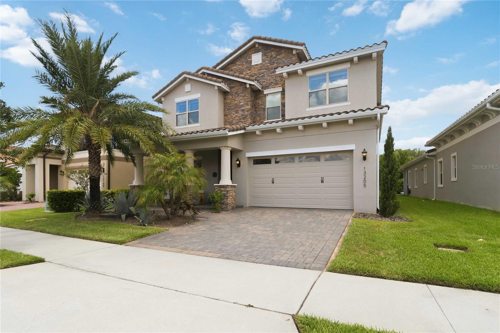 Be amazed by this stunning " 5 years young " 2 story mediteranian home, located in the popular Eagle Creek Golf Course community in the Lake nona area. This nicely sized 4 bedroom, 4 full baths home has an awesome open concept where the beautifully adorned gourmet kitchen flows to the Dining / Living room spaces, making family gatherings a breeze. There is a guest bedroom on the 1st floor, for those times family needs to stay overnight after those great family get togethers. This home has the grand primary bedroom with custom his and hers closets and an En-suite bathroom to die for on the 2nd floor. This home has another 2 bedrooms and a super sized loft area that has access to a wrap around screened-in balcony that can also be accessed from the Primary sweet for all those entertaing moments you and your family will enjoy. When heading back down to the first floor and the family is looking for some good times and fun in the sun at home, they can have a blast in the very large backyard with conservation views, a full sized rear covered lanai with a stacked outdoor kitchen, an entertainers dream. This 24 Hrs Gated Community has a clubhouse with a pro shop, lounge, restaurant, large recreational area for residents featuring swimming pools, exercise gym, tennis and basketball courts, child playground and indoor meeting room for activities. Eagle Creek's HOA has a year busy schedule of free events and activities. Located in the highly sought after Lake Nona area, minutes from the medical city that includes UCF Medical School, Nemours hospital, the new US Tennis Association and close access to 417 and 528. This home is a must see.... Schedule your showing today.