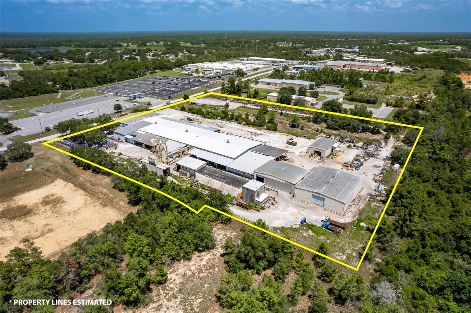 Available Late 2025. 94,510 SF heavy industrial manufacturing facility with M2
zoning and 29 foot maximum ceiling height. presently configured for wood product operations,
however other heavy industrial uses are permitted. The
property includes two additional undeveloped parcels and
offers 24.5' beam clearance in the front, with 21' clearance in
the main free-span section. Door heights up to 18 feet. See attached offering memorandum for specifics. Power infrastructure features
3200 amps at 480V, along with natural gas and an active
sprinkler system. Three separate access gates.
accommodate semi-truck circulation and logistics.
availability projected for late 2025. Please see attachments for OM and site plan. Inquire today!
