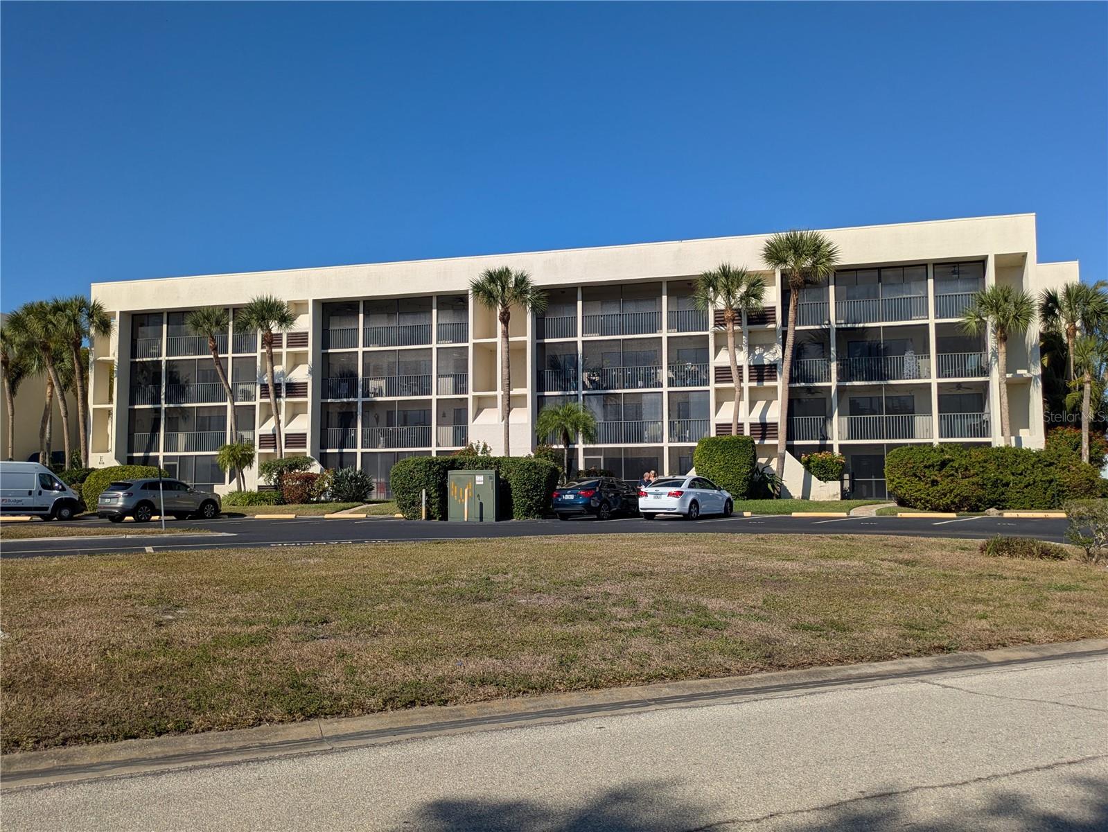 FIRST FLOOR CONDO WITH NEW ROOF.  CERAMIC TILE, EASY PRIVATE ENTRANCE DIRECTLY FROM THE PARKING LOT.  RELAXING AFTERNOON SUN ON THE LINAI. 2 BATHROOMS. EASY WALK TO THE POOL. FULLY MAINTAINED COMMUNITY.