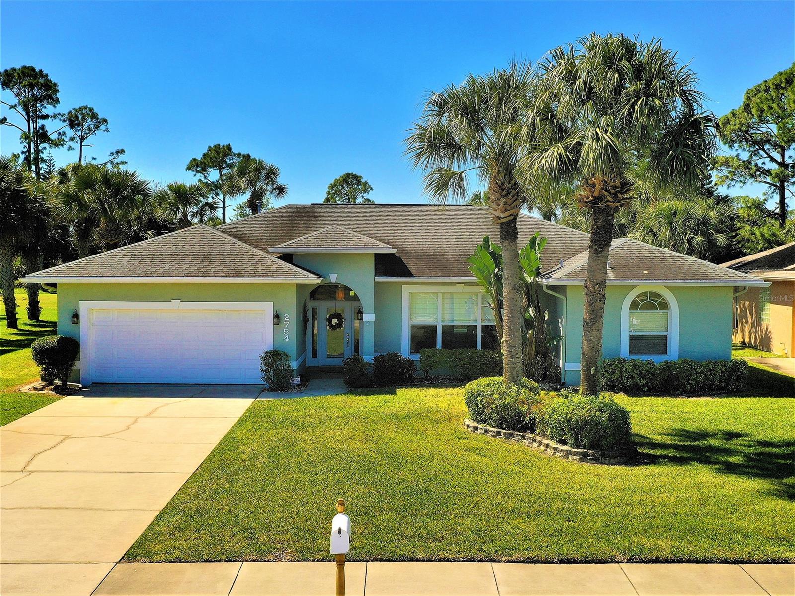 This one has it all!  3 bedroom, 2 bathroom home full of updates.  Private screened pool and hot tub directly on the golf course with lake views from the front!  This home has granite countertops in kitchen with stainless steel appliances - natural gas stove, both bathrooms with granite counters as well, double sinks with his/her walk in closets in master. French doors from master to pool deck. Vaulted ceilings, arched windows, custom window treatments, split plan with third bedroom connecting to the hall bath giving your guests privacy.  Custom shelving in front living room.  Tons of space for entertaining inside or outside on the pool deck overlooking the golf course where you can enjoy the evening sunsets.  Seller is having new roof put on 3rd week of March, along with a brand new gas water heater just installed.  Too many updates to list.  Call for your private showing! ;Water: City