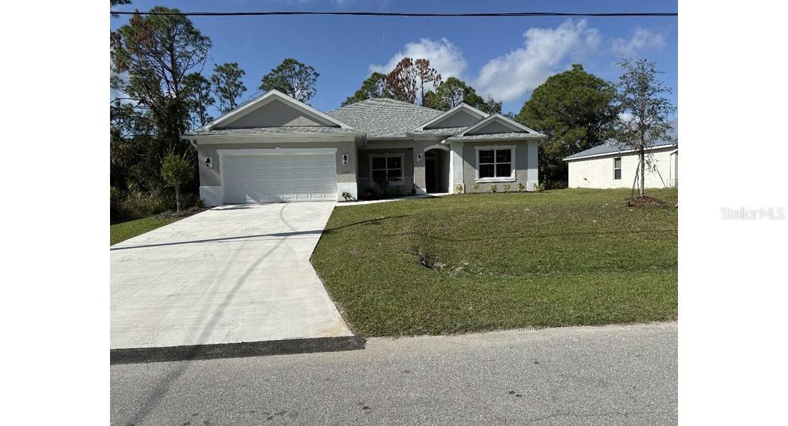 PRICE REDUCED!! New construction. Move in ready. This 3 bedroom home has spacious rooms with an open/split floor plan. 9'4" ceilings. Kitchen has a granite countertop. Breakfast bar compliments the kitchen. The great room is in combination with the kitchen as an open concept. There are French doors which lead to the covered porch. The split bedroom plan has a primary bedroom which features a walk in closet, walk in shower and double sinks. The home has a separate laundry room with cabinet space situated between the kitchen and 2 car garage.