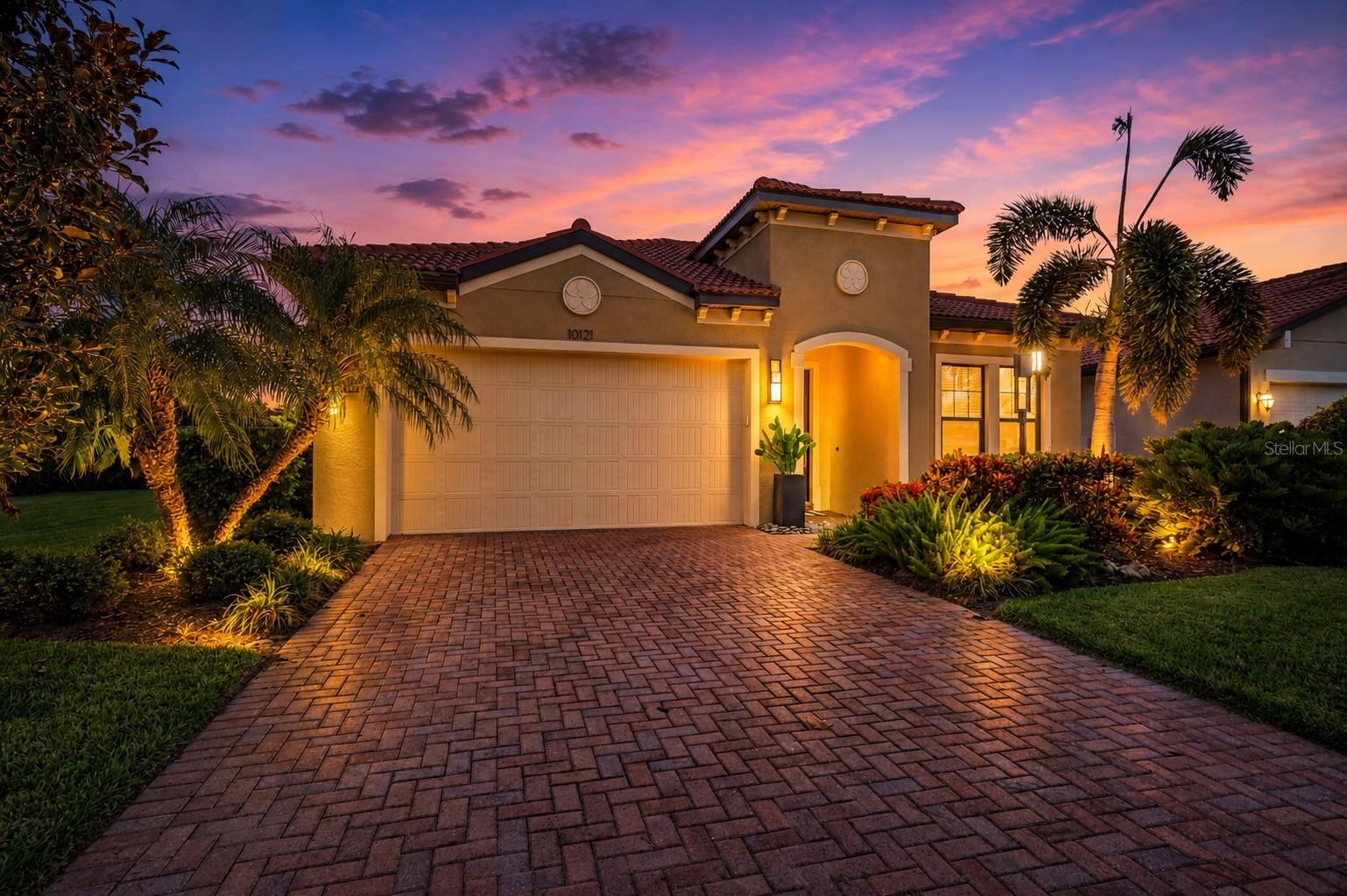 Introducing this beautiful 3BR/3.5BA waterfront pool home in Rosedale Golf & Country Club, Bradenton. You will be impressed with the outdoor kitchen and extensive upgrades. 

Perfectly positioned with a waterfront view in Rosedale Golf & Country Club, this extensively upgraded 3-bedroom, 3.5-bath residence offers the ideal blend of refined finishes, quality construction, and exceptional indoor-outdoor living. Built in 2016, the one-story home spans approximately 2,502 square feet and features a split-bedroom floor plan, dedicated den, screened lanai, pool and spa, all thoughtfully designed to make the most of its waterfront home-site.

Inside, engineered hardwood flooring flows throughout the home, complemented by 8-foot interior doors, upgraded lighting, designer hardware throughout, tailored window treatments and ceiling speakers in the great room. The den features an electric fireplace, creating a warm and inviting space for a home office, media room, or quiet retreat. The primary suite is enhanced with California Closets, custom-framed mirrors and tiled backsplash in the primary bath, while the laundry room also features a coordinating tile backsplash. A Nest thermostat adds modern convenience and smart home functionality.

The kitchen flows seamlessly into the great room beneath a beautiful coffered ceiling leading to the lanai, where an enhanced outdoor lighting package and a fully equipped outdoor kitchen, with durable polymer cabinetry, creates an exceptional space for entertaining. Overlooking the pool, spa, and tranquil water views, this private retreat is equally suited for gathering with guests or enjoying a quiet evening at home.

Additional improvements include a front entry door with impact glass inserts, impact windows in the front guest suite, commercial-grade epoxy flooring in the garage, and built-in metal storage cabinets that maximize organization and functionality. Built with concrete block construction and a concrete tile roof, the home also features hurricane protection elements and a recently replaced air conditioning system in 2025, offering added confidence for the next owner. 

Located within the gated Rosedale Golf & Country Club, residents have the opportunity to enjoy optional golf and tennis memberships, allowing owners to choose the club lifestyle that best fits their needs. 

Whether you're looking for a full-time residence or a seasonal retreat, this meticulously maintained home combines timeless design, extensive upgrades, and effortless Florida living in one exceptional waterfront property.