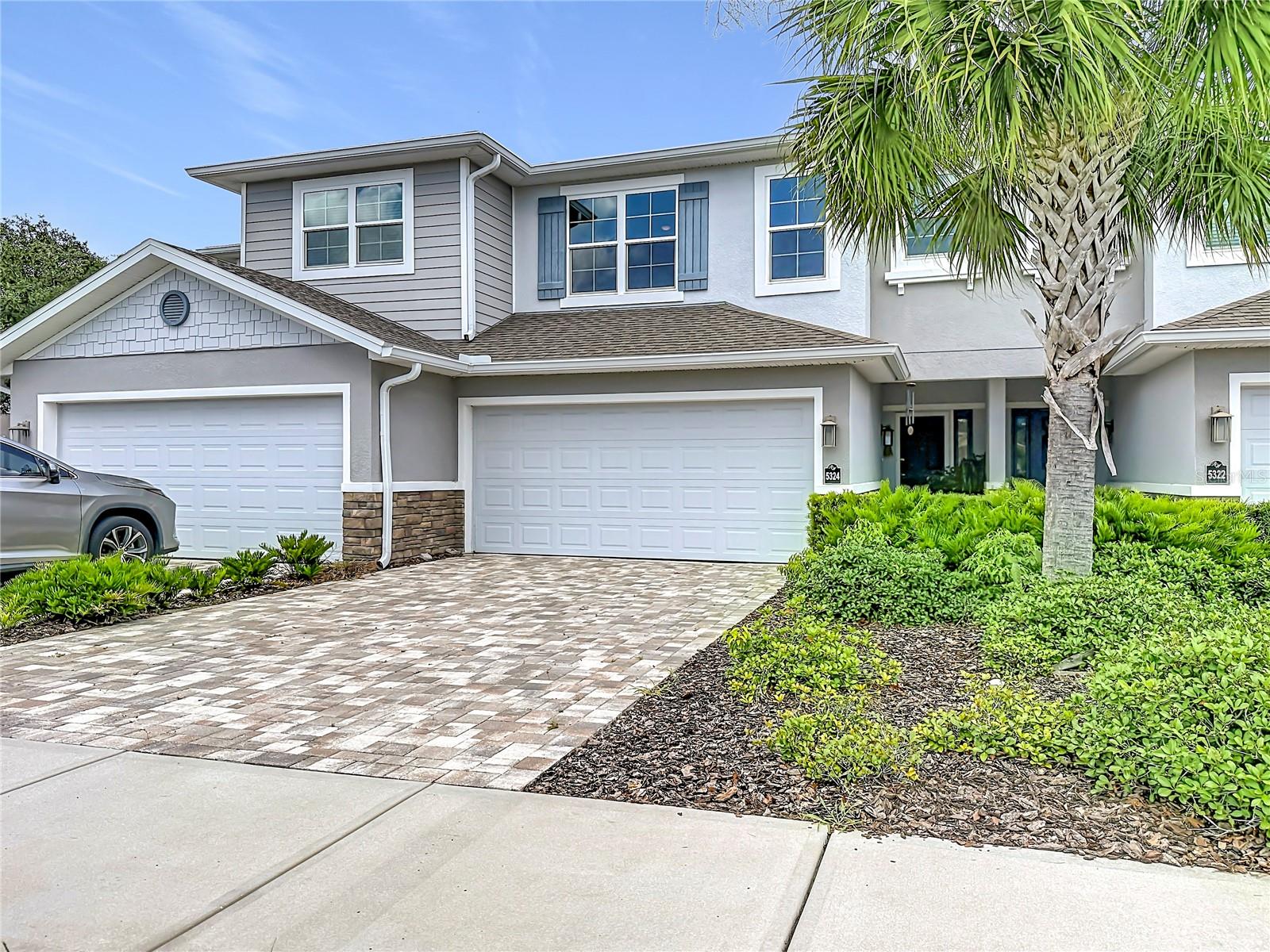 NEWER BUILD TOWNHOME in the beautiful community of Riverwalk Preserve. Gorgeous 3/2.5 townhouse with BONUS ROOM/STUDY/OFFICE with barn door on the main floor. Large open floorplan concept, neutral colors throughout makes this place truly move in ready. Backs up to a beautiful preserve to enjoy the conservation views. Chefs kitchen offers granite countertops, custom cabinets, pantry and massive island/bar overlooking the dining room and family room. Family room has a a built in deco fireplace offering stunning aesthetics and more. Primary suite has a walk in closet and large en suite bath. Builder spared no expense with upgraded finishes throughout, LVP flooring, hurricane rated windows and doors for energy effeciency and noise reduction! Inside laundry room and extra bedrooms are large in size. Garage is spacious  and has epoxy flooring! This community is close to everything yet offers its own sanctuary for a peaceful lifestyle. Enjoy direct access to walking paths along the Cotee River with a dock for kayaking or canoeing. LOW MONTHLY HOA DUES COVER SO MUCH! Cable, Internet, Water, Sewer, Maintaining the building and grounds. Community pool is close by and subdivision is PET FRIENDLY. MUST SEE AND THE BEST PRICE IN THE NEIGHBORHOOD.