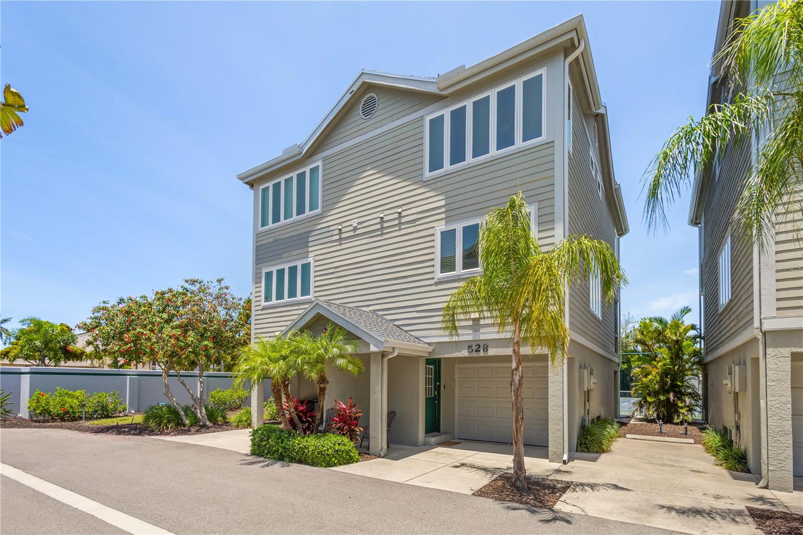 Elevated, renovated, fully furnished, pet friendly, close to the beach AND a short term rental opportunity on Longboat Key?! This is the one you've been looking for! You don't have to be a tennis player to understand the value of this fabulous townhome in Cedars Tennis Club. This 2 bedroom, 2 and a half bath condo is the perfect island escape. Beautifully updated and furnished, all you’ll need to bring is your bathing suit and a toothbrush to start enjoying island life to the fullest. Add to it a short term two week rental policy, this could also be your perfect investment property. Current annual income has been around $50,000, but that also includes a lot of family enjoyment in between. New impact windows, a new roof, 2021 air conditioning units and a private garage make this condo even more appealing. Spend your days in the sun with just a short walk to the beach or the Bay. Enjoy the community swimming pool, with a fabulous tiki bar. Join the club to enjoy the fitness center and tennis privileges. Take a bike ride on 11 miles of bike paths down the island or a walk to Joan Durante Park. The cultural mecca of downtown Sarasota is just a short drive away. And don’t forget to make time to see the stunning evening sunsets. The Longboat Key lifestyle is waiting for you!