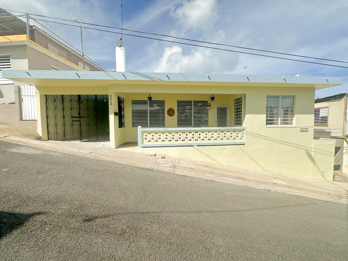 Move-in ready concrete home located in the heart of Isabel Segunda, Vieques. This 3-bedroom residence offers an in-town oasis just steps from restaurants, shops, and the ferry terminal. The home features two full bathrooms, with one full bath located in a separate exterior structure. An additional air-conditioned shop, craft, or laundry room offers ocean views and flexible use. Enjoy spectacular rooftop views of Puerto Rico’s main island and the El Fortín Conde de Mirasol. Well maintained and in great condition with upgraded windows—this property is ideally located and ready for immediate occupancy.