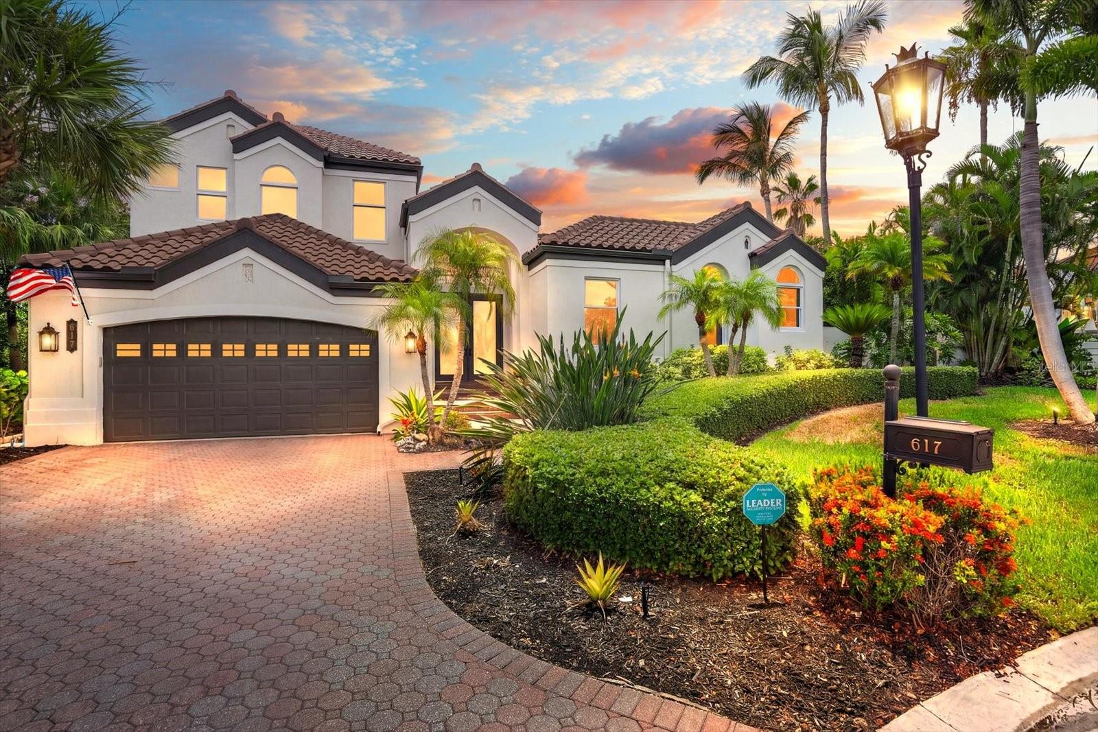 Welcome to **617 Weston Pointe Court**, where timeless elegance meets the Florida waterfront lifestyle. Nestled within one of Longboat Key's most desirable gated golf communities, this exceptional **four-bedroom, five-bathroom** residence offers an extraordinary blend of luxury, privacy, and direct boating access to the Gulf.

From the moment you step inside, you'll be captivated by the expansive open floor plan, soaring ceilings, and breathtaking views overlooking the tranquil canal. Designed for both everyday living and effortless entertaining, the spacious great room flows seamlessly into the gourmet kitchen and dining areas, creating a bright and inviting atmosphere throughout the home.

The thoughtfully designed floor plan features a luxurious primary suite and two additional bedrooms on the main level, while the upstairs loft provides a versatile living space accompanied by an additional guest bedroom, offering comfort and privacy for family and visitors alike.

At the heart of the home lies an incredible private courtyard oasis. The sparkling pool creates a resort-style setting between the main residence and a detached cabana complete with its own kitchenette and full bathroom—an ideal space for overnight guests, a private office, fitness studio, or poolside entertaining.

For boating enthusiasts, this property truly stands apart. The **privately owned boat slip conveys with the home**, offering exceptional value and convenience. Positioned as the **last slip on the left**, it provides one of the easiest locations in the marina for entering and exiting with your boat, making every trip on the water effortless. The slip is equipped with a **boat lift**, and from your dock, it's approximately **15 minutes through the scenic canal to the open waters of the Gulf**, allowing you to spend less time navigating and more time enjoying life on the water.

Whether you're hosting elegant gatherings around the courtyard pool, enjoying peaceful waterfront sunsets, or setting out for a day of boating, this remarkable Longboat Key residence offers the perfect combination of luxury, comfort, and coastal living.

Don't miss this rare opportunity to own an exceptional waterfront home complete with a transferable private boat slip in one of Longboat Key's most sought-after communities. Schedule your private showing today and experience Florida waterfront living at its finest.