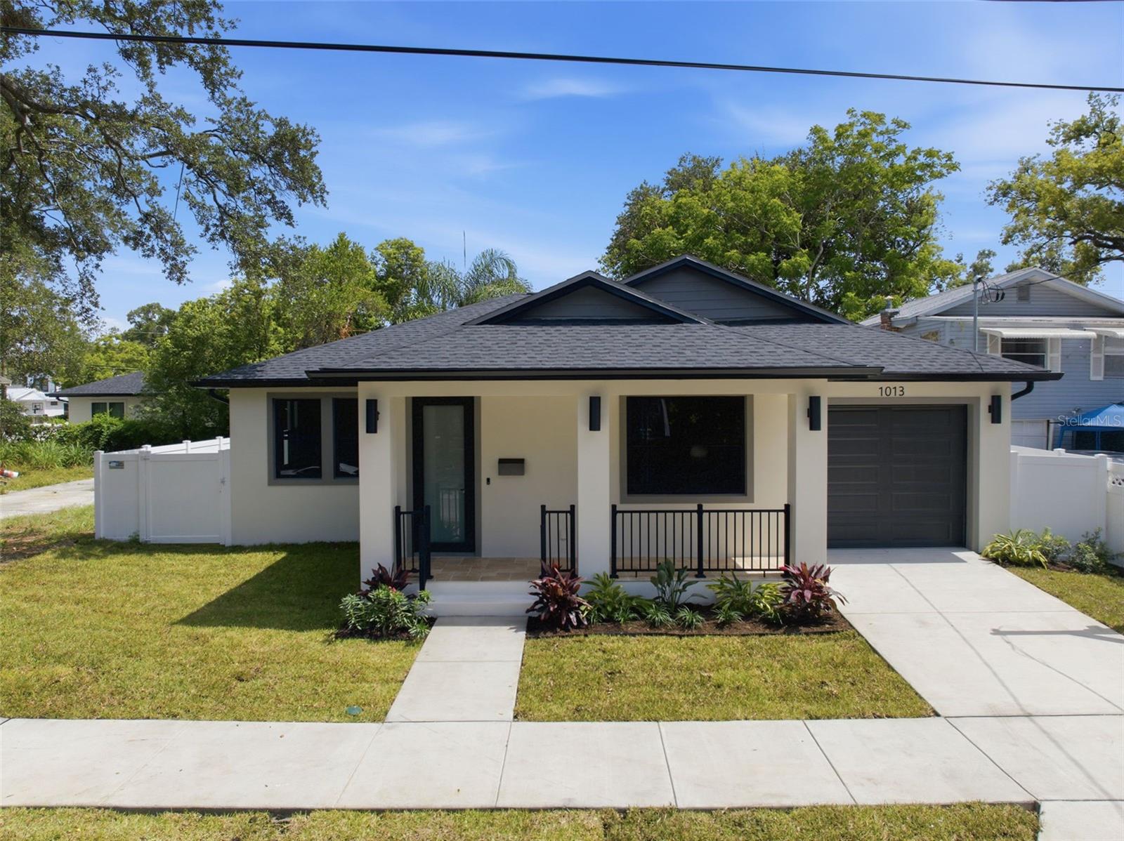 Welcome to this exceptional new construction home in the heart of Historic Ybor City, where timeless craftsmanship meets modern luxury. Every detail of this 3-bedroom, 2-bath residence has been thoughtfully designed with quality and functionality in mind.

Step inside to discover a true split-bedroom floor plan offering privacy and comfortable everyday living. The spacious primary suite is a true retreat, featuring a spa-inspired ensuite with dual Taj Mahal quartz vanities, an oversized walk-in shower, and a massive walk-in closet.

At the center of the home is a stunning chef’s kitchen showcasing slim shaker wood-tone cabinetry, Level 3 Brezza Wave quartz countertops, a custom vent hood, premium finishes, and an open-concept design perfect for entertaining. The attention to detail continues throughout with luxury materials, designer fixtures, and high-end craftsmanship rarely found at this price point.

Enjoy Florida living from the inviting front porch finished in beautiful travertine tile, while the oversized one-car garage features a professionally finished epoxy floor. Hurricane impact windows with premium tinting provide added energy efficiency, comfort, and peace of mind.

Location is everything, and this home delivers. Situated just minutes from the vibrant Ybor City Historic District, you’ll enjoy easy access to local coffee shops, award-winning restaurants, breweries, boutiques, and the famous 7th Avenue entertainment district. Hop on the free TECO Streetcar for a quick ride to Downtown Tampa, Water Street, the Tampa Riverwalk, Benchmark International Arena, Sparkman Wharf, and the Channel District. Commuters will appreciate the convenient access to I-4, I-275, the Selmon Expressway, and Downtown Tampa, making travel throughout the Tampa Bay area effortless. The surrounding area continues to experience significant investment and redevelopment, making East Ybor one of Tampa’s most exciting and fastest-growing neighborhoods. 

If you’ve been searching for a home that offers superior craftsmanship, upscale finishes, and an unbeatable location close to everything Tampa has to offer, this is one you won’t want to miss.