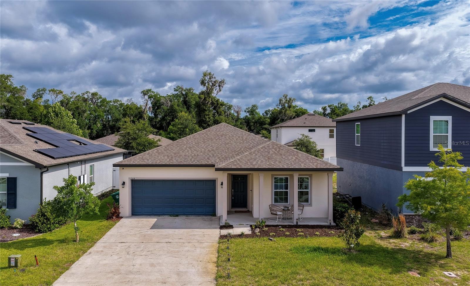 Like New! This charming 3-bedroom, 2-bath home built in 2021 offers 1,636 sqft of bright, open living space. Located in the Lincoln Oaks community with an attached 2-car garage. Step inside to an inviting open-concept great room connecting the living, dining, and kitchen areas. The well-appointed kitchen offers quartz countertops, stainless steel appliances, a decorative tile backsplash, abundant cabinetry, a spacious center island with seating, and an oversized walk-in pantry that provides exceptional storage. The primary suite serves as a comfortable retreat with plush carpeting, an attached walk-in closet with built-in shelving, and a private en-suite bathroom featuring a double sink vanity and a glass-enclosed shower. Two additional bedrooms are generously sized with neutral finishes, ideal for family, guests, or a dedicated home office setup. Outside, the backyard patio overlooks a spacious green yard - perfect for outdoor grilling, gardening, or future enhancements. Residents of Lincoln Oaks enjoy access to a community pool and a convenient location near shopping, dining, healthcare facilities, parks, and major roadways. This move-in-ready home combines modern finishes, functional living spaces, and a welcoming community setting in one exceptional package. All information recorded in the MLS is intended to be accurate but cannot be guaranteed.