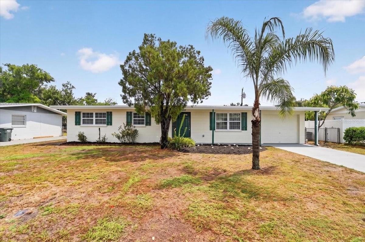 Move-in ready 3-bedroom home with a 1-car garage, updated interior finishes, and a fully fenced backyard in Bradenton. This freshly painted home offers approximately 1,056 square feet with terrazzo flooring throughout, creating a clean and cohesive look from room to room. The updated kitchen features granite countertops, recessed lighting, and an open connection to the main living area. The bathroom has also been improved with granite finishes and a tiled shower.

All three bedrooms offer natural light and terrazzo flooring, while the garage has been freshly painted and cleaned for added storage, parking, or workspace flexibility. Outside, enjoy a rear patio and a fully fenced backyard with room for pets, entertaining, gardening, or outdoor relaxation. A greenhouse may also be available for a buyer who enjoys growing plants or creating a backyard garden space.

Major updates include a roof and A/C system that are approximately two years old. Conveniently located in Bradenton with easy access to local shopping, dining, schools, and area amenities. Schedule your showing today.