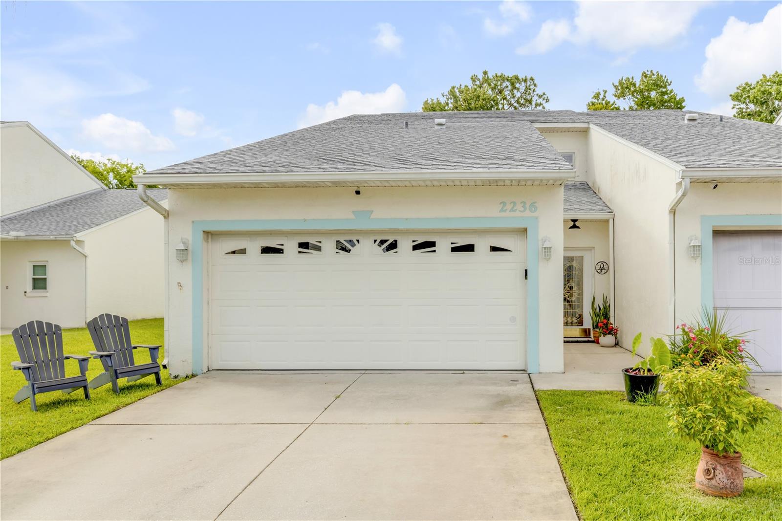 Beautifully updated and move-in ready, this spacious 2-bedroom, 2.5-bath townhome in the desirable Hidden Pines community offers comfort, style, and low-maintenance coastal living in the heart of New Smyrna Beach. Featuring two private en-suite bedrooms and a bright, open-concept layout, this home provides both functionality and flexibility with additional space that could easily serve as a home office, guest area, media room, or potential third bedroom. The light-filled main living area creates a warm and inviting atmosphere with seamless flow between the living, dining, and kitchen spaces, making everyday living and entertaining effortless. Private outdoor space offers the perfect spot to relax, unwind, or enjoy the coastal lifestyle. The beautifully remodeled kitchen, updated in 2022, is designed with both style and convenience in mind and features upgraded 42" cabinetry, stone countertops, a farmhouse-style sink, touchless kitchen faucet, stainless steel appliances, and a reverse osmosis water filtration system. The thoughtful updates continue throughout the home with a newer roof, hurricane shutters, no flood history, and a brand-new HVAC system installed in 2025, offering peace of mind for years to come.
Hidden Pines is conveniently located just minutes from New Smyrna Beach’s beautiful coastline, popular restaurants, shopping, golf, marinas, and the local charm of Canal Street and Flagler Avenue. Whether you are searching for a full-time residence or seasonal getaway, this property offers the ideal blend of location, updates, and easy Florida living. Schedule your private showing!