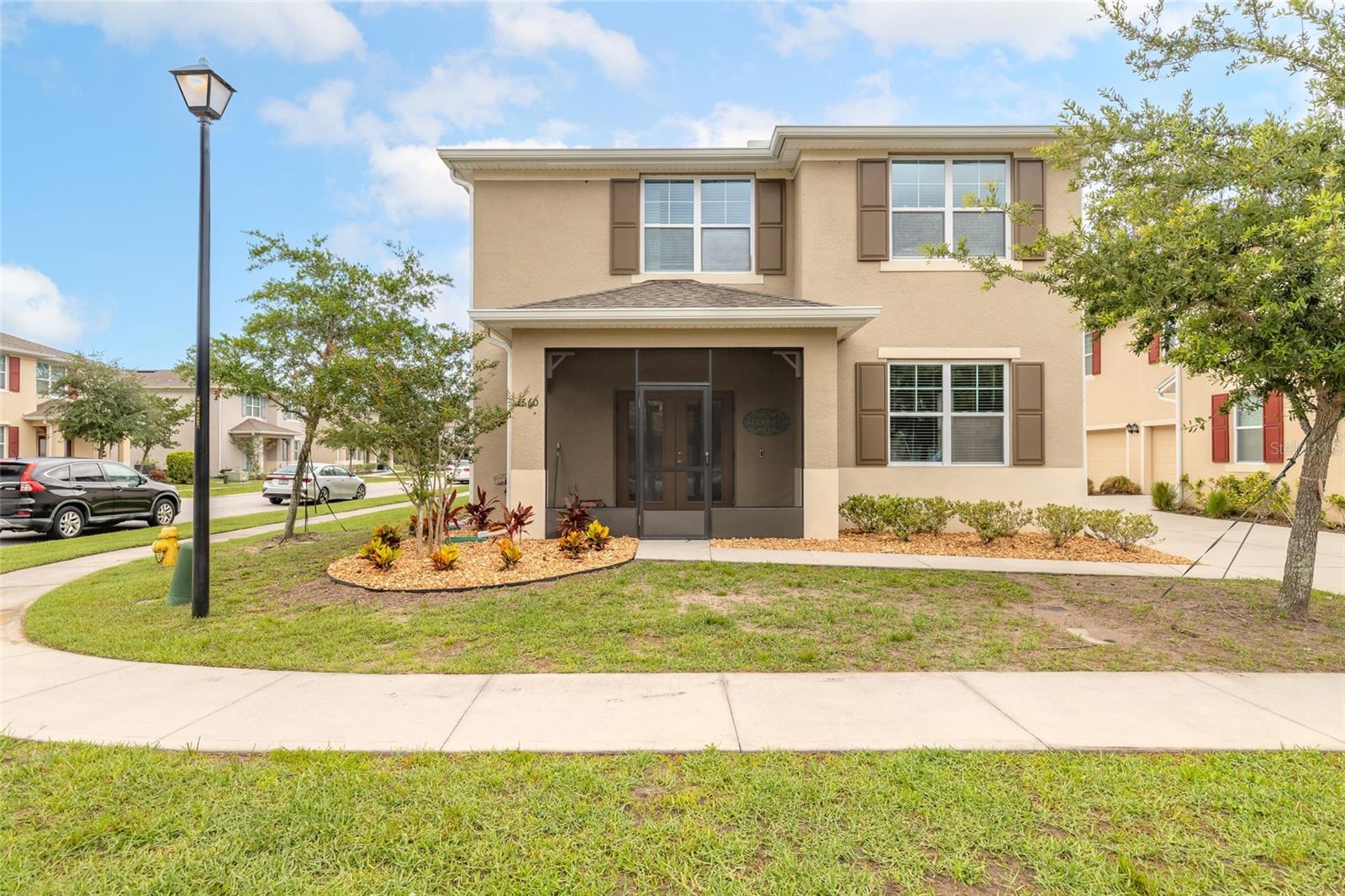 RARE OPPORTUNITY: Assumable 2.62% Interest Rate Available! Imagine locking in a mortgage rate from a few years ago. This beautiful Port Orange townhome features a low-interest, assumable loan with a balance of approximately $202,000 that can be legally transferred to a qualified buyer. Compared to today's current market rates, this could save you hundreds per month. From the moment you walk up to this home, the townhome feels welcoming, modern and completely move-in ready. Step inside to an open-concept main floor that balances style and comfort. The kitchen is the heart of the home, featuring an island wrapped in timeless shiplap, modern pendant lighting and a sleek tile backsplash that carries into the bathrooms. The shiplap detail continues onto a gorgeous accent wall giving the home a cohesive, custom feel. The home features tile in the main living areas and durable luxury vinyl flooring in the bedrooms for a low-maintenance lifestyle. The laundry is featured upstairs with the bedrooms making laundry a breeze. You will find a 2 car garage for parking and extra storage as well as a beautiful screened in lanai to enjoy that morning coffee or wind down your day with a cold drink. Located in a highly desirable Port Orange neighborhood, this home offers the perfect blend of low-maintenance lifestyle and an unbeatable financial advantage. AC, Water Heater, Roof original with build (2019). All information deemed to be accurate but must be confirmed by buyers.