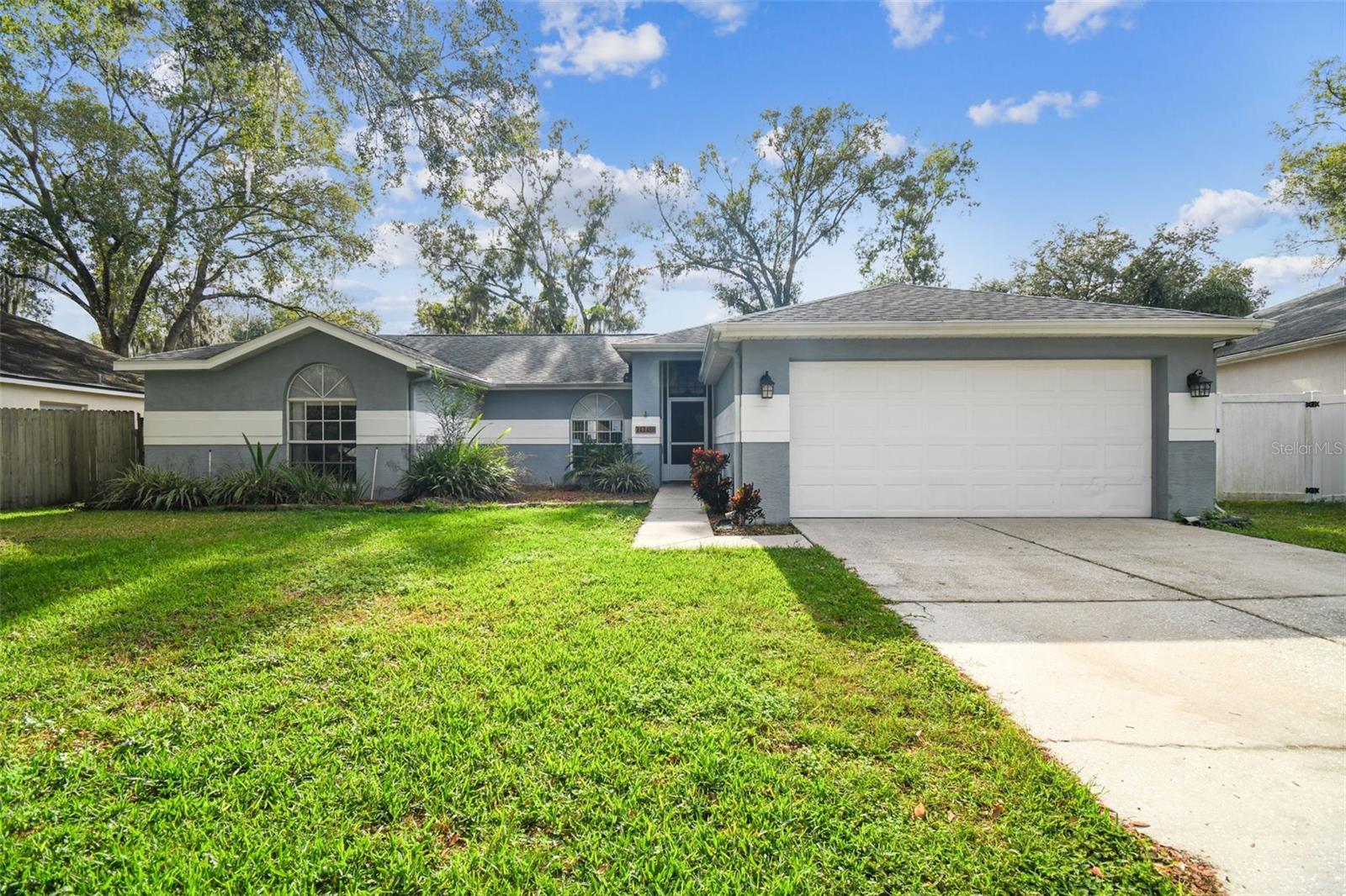 WOW CHECK OUT THE RECENT IMPROVEMENTS ON THIS FANTASTIC HOME! MOTIVATED SELLER!!!  This Pool home is ready for IMMEDIATE occupancy with no wait!   Seller is offering a Premium Home Warranty.  PRICE IMPROVEMENT FOR THIS SPACIOUS HOME with a PRIVATE POOL!  Very large side and front yard, with a large lanai in the back! Located in sought after Land o Lakes, right in the heart of everything with fantastic A rated schools! Discover Your Tranquil Oasis in this centrally located Twin Lakes community! NO CDD FEES means lower taxes on this home compared to some of the competition.  This 3-bedroom, 2-bathroom pool home, complete with oversized 2 car garage is truly a hidden gem in a serene community that greets you with tree lined streets and is surrounded by mature trees and lush greenery. Practicality meets comfort with a generously-sized driveway and a spacious, 2-car garage providing ample parking options for your family and guests. Inside, the heart of the home is the updated kitchen, a haven for culinary enthusiasts. The spacious and open kitchen features wood cabinets and island / breakfast bar with level 2 granite. The flow leads into the inviting family room, which boasts a cozy fireplace - the perfect spot for unwinding or gatherings because the family room is adjacent to the screened-in lanai, thoughtfully equipped with a large sunshade, and adjacent pool, making it an ideal space for hosting friends and family or enjoying some downtime.

The layout offers flexibility with additional room the separate formal living and separate formal dining areas are great for those special occasions or additional living space. 

Privacy is ensured with the well-thought-out split bedroom floor plan. The primary owner's suite boasts a soaking garden tub, a separate shower stall, double vanity, and a spacious walk-in closet complete with a closet system, providing plenty of storage. The indoor laundry room is complete with washer and dryer hook up.

Stepping outside, you'll find a sparkling pool, next to the oversized patio, perfect for cooling off and creating cherished memories with your family in the Florida sunshine.

This home is not just a place to live; it's a haven of comfort and style. Located in the sought-after Twin Lakes community.   This home is in the Central Location of Land O Lakes. Enjoy the perks of living in a thriving community with easy access to a plethora of brand-new amenities, shopping, outlet mall, lots of restaurants, cutting-edge hospitals, and top-notch parks, every convenience is just minutes away.

Land o Lakes is a Gateway to Tampa, you'll have seamless access to the bustling city of Tampa. Commuting is a breeze with I-75 nearby, allowing you to reach Tampa's major sports attractions, entertainment venues, and cultural hotspots within a short drive.

Here is Florida we are also a Coastal Paradise. Imagine weekends spent on Florida's pristine Gulf Coast beaches. From white sands to turquoise waters, your slice of paradise is just a short driving distance from top notch beaches. Whether you're into boating, swimming, sunbathing, or water sports, the beach right here.

Effortless Travel here because The Tampa International Airport is a convenient drive away, making business trips or vacations a breeze. THIS HOME IS FOR SALE ONLY and NOT FOR RENT!   AVOID RENTAL SCAMS AND INQUIRE WITH THE LISTING BROKER. Information is deemed accurate but should not be relied upon without verification.