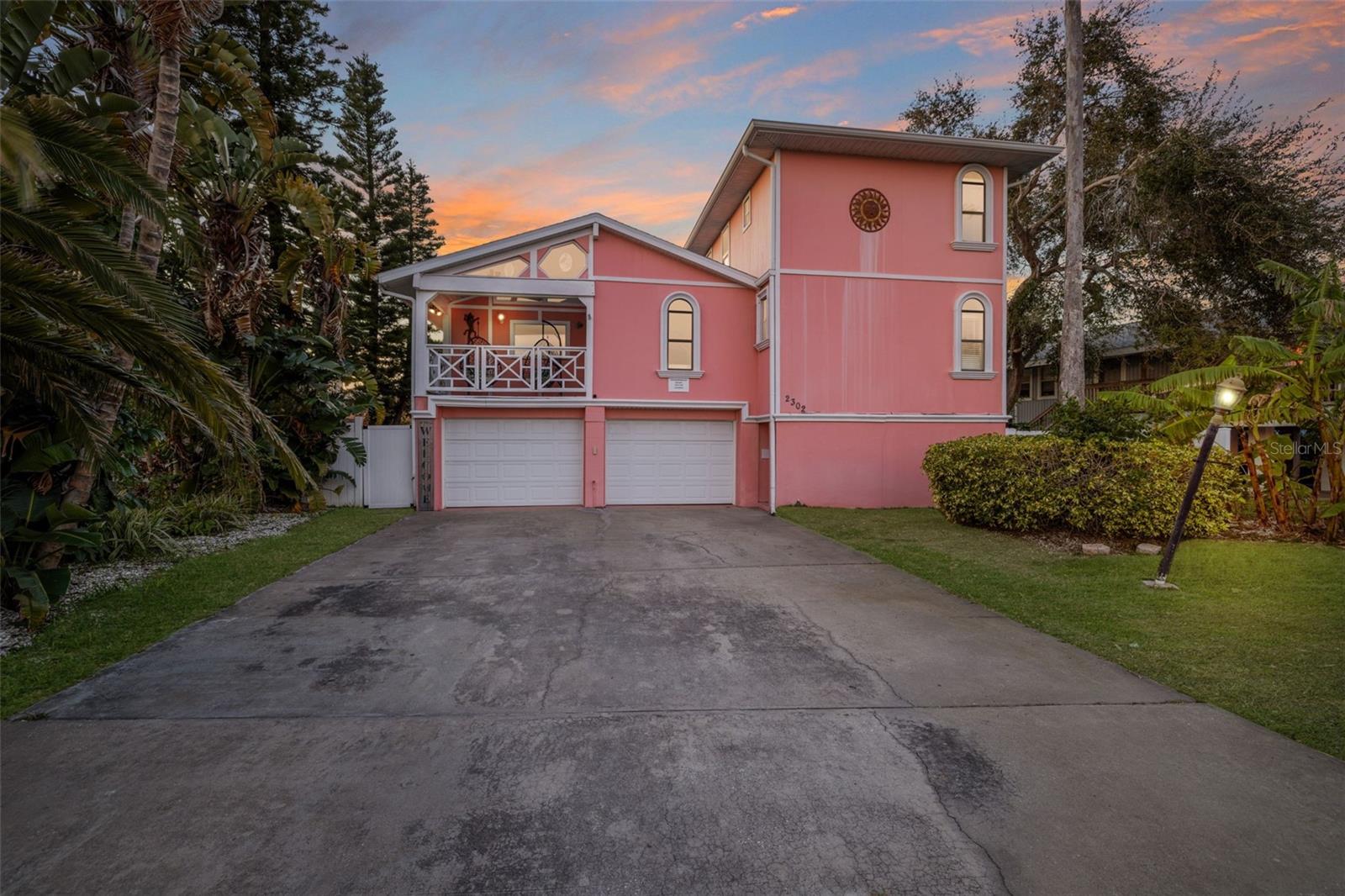 A Proven Cash Flow Machine — Steps from the Gulf

This isn't just a beach house — it's a turnkey income-producing powerhouse on one of Florida's most sought-after barrier islands. With over $200,000 in vacation rental revenue in 2025 and $180,000+ already booked for 2026, the numbers speak for themselves. The demand is real, the returns are exceptional, and the lifestyle is unmatched.

Welcome to 2302 Bay Blvd — a stunning Key West–style pool home just steps from the white sand beaches of Indian Rocks Beach. From the moment you arrive, the tropical energy is undeniable. The ground level opens to your own private resort: a heated PebbleTec pool and illuminated spa, a fully equipped tiki bar, and a 500-square-foot fire pit area — all enclosed within a full privacy fence. This is the kind of outdoor space guests rave about and book again for.

Step inside the main living level and soaring cathedral ceilings, abundant natural light, and a wide-open floor plan immediately set the tone. The gourmet kitchen features stainless steel appliances, a center island, granite countertops, and solid wood cabinetry — ideal for everything from family dinners to catered events. Just off the kitchen, a private deck overlooks the Intracoastal Waterway, offering serene bay views and unforgettable sunsets.
The upper-level primary suite is a true owner's retreat, complete with a beautifully updated private bathroom and water views from both east- and west-facing windows. The main floor offers two additional spacious bedrooms and a full bathroom with a walk-in shower — perfect for guests or family.

Here's where the investment gets even smarter. A lock-out unit seamlessly connects to the main home, featuring 2 bedrooms, 1 bathroom, its own living room, full kitchen, dining area, and a wraparound balcony overlooking the tropical oasis below. Rent it out independently for added income, or open it up to accommodate larger groups. Flexibility like this is what drives top-tier rental performance.

Property Highlights

Proven Revenue: $200K+ gross rental income in 2025; $120K+ already booked for 2026

Prime Location: Steps to Gulf beach access in Indian Rocks Beach — one of the Tampa Bay area's most desirable vacation destinations

Resort-Style Outdoor Living: Heated pool & spa, tiki bar, 500 sq ft fire pit area, full privacy fence

Flexible Layout: Lock-out 2BR/1BA unit can operate as an independent rental or extend the main home to 5BR/4BA

Intracoastal Waterway Views: Deck with bay views from the main living level and primary suite

Parking for 8 Vehicles: 4-car garage with hurricane-rated doors plus 4 additional exterior spaces — a rare and valuable asset in a beach 
community

Designer Interiors: Thoughtfully designed with tropical-luxe finishes, plush furnishings, and Instagram-worthy bedroom suites that keep guests coming back