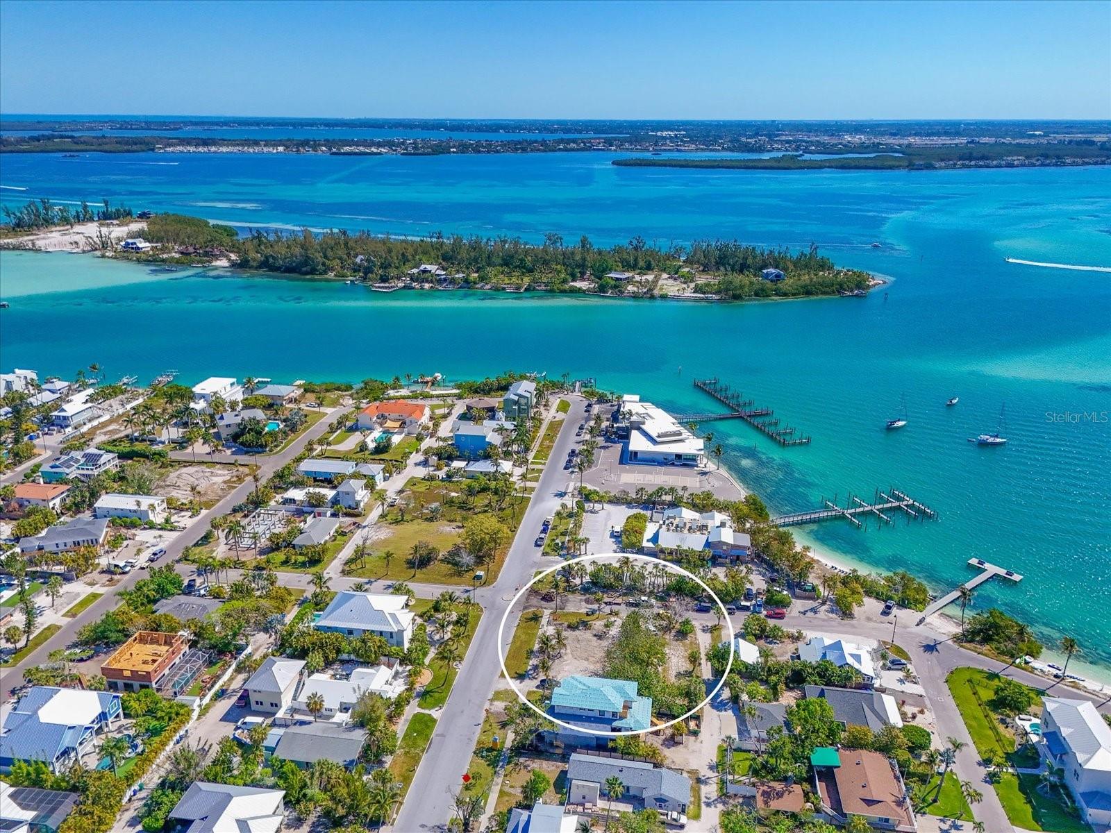 Rare corner-lot opportunity in the historic and highly sought-after Longbeach Village on the north end of Longboat Key. Build your own tropical retreat with the potential for views of Sarasota Bay. Ideally located just a short stroll from beloved local favorites Mar Vista Dockside Restaurant & Pub and Shore Longboat Key. A public boat launch is only half a block away, and convenient public beach access awaits at the west end of Broadway Street.
Even more opportunity awaits, as the adjacent lot is also available for purchase, creating the potential to combine both properties for a larger homesite, expanded outdoor living space, or a truly exceptional island compound. A prime location to create your dream coastal getaway.