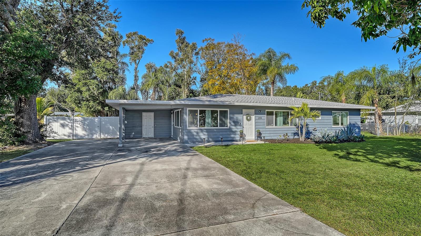 Welcome to 209 Briggs Court, a charming Florida home ideally located just minutes from Downtown Sarasota, tucked just off Fruitville Road with easy access to I-75, award-winning Gulf beaches, and everything Sarasota has to offer.

This inviting residence blends timeless character with thoughtful updates, featuring original terrazzo floors, an open living space ideal for entertaining, and a spacious kitchen with ample storage—perfect for everyday living or hosting family and friends. All bedrooms offer generous closet space, adding to the home’s functionality and comfort. Updated in 2020, the home provides peace of mind while maintaining its classic Florida charm.

The home also features a dedicated laundry room with a bonus room just off of it, offering flexible space ideal for a home office, playroom, storage, or hobby area—adding even more versatility to the floor plan.

A bright Florida room lined with windows creates the perfect spot to enjoy your morning coffee or unwind at the end of the day. Step outside to a large, fenced backyard with plenty of room to play, garden, or entertain, complemented by fruit trees and a beautiful mango tree in the front yard.

Whether you’re searching for a primary residence, seasonal winter retreat, or income-producing rental, this property offers flexibility and opportunity to suit your needs—all in a central Sarasota location close to downtown dining, shopping, beaches, and major roadways.

Character, location, and potential—Briggs Court delivers it all!