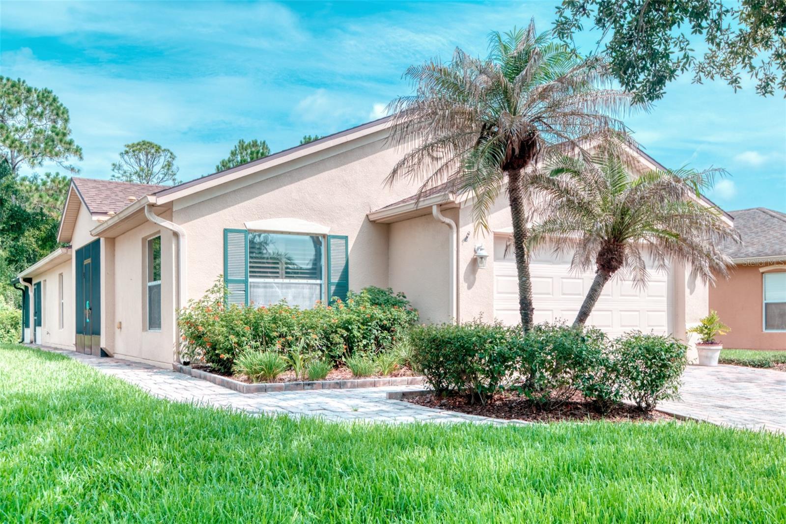 Discover this beautifully upgraded Bordeaux model featuring 2 bedrooms, 2 bathrooms, a den, and a peaceful conservation lot. This meticulously maintained home offers tile flooring throughout, elegant plantation shutters, and granite countertops that add style and sophistication throughout the home. The upgraded kitchen is a chef's delight with new stainless steel appliances, upgraded cabinetry, under-cabinet lighting, and a spacious kitchenette complete with a built-in desk and hutch—perfect for organizing recipes or a home office. The highlight of this home is the expansive covered and enclosed lanai, featuring a decorative painted concrete floor and tranquil conservation views, creating the perfect space for relaxing or entertaining year-round. The spacious primary suite boasts dual custom walk-in closets and an updated en-suite bath with a custom vanity and sink. The guest bathroom has also been upgraded with a custom vanity and sink. Enjoy worry-free living with a new roof (2022), HVAC system (2022), and fully paid-off solar panels that help keep electric bills low. Paver walkways extend along the side of the home to the rear, adding both beauty and convenience. This exceptional home combines luxury, energy efficiency, and privacy in one outstanding package. Schedule your private showing today! With amenities such as 14 pools, two championship 18-hole golf courses, tennis, pickleball, basketball, softball, and over 300 clubs, plus spa services and two state-of-the-art exercise facilities on over 4,200 acres of conservation, you'll have everything you need at your fingertips. HOA fees include items such as landscaping, irrigation, high-speed fiber internet, and TV included in the HOA. For your convenience, Florida Poinciana Hospital is directly across the street along with a 42,000 square-foot medical office building. Also recently opened across the street is the new Poinciana Lakes Plaza. Here are some of the stores that have already opened: Sprouts Farmers Market, TD Bank, Outback Steak House, First Watch Restaurant, Bojangles,Outback Five guys and retail stores. Please come to Solivita and enjoy the dream life. Just unpack your toothbrush and move right in.