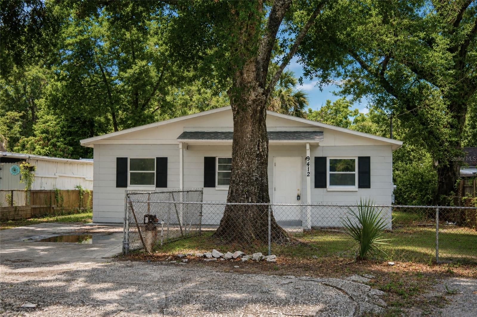 Welcome to 9412 N Elmer St in Tampa! This 3-bedroom, 1-bathroom home offers 922 sqft of living space in a convenient Tampa location. The fully fenced front and backyard provides is great for pets and family. Inside, you'll find a brand-new kitchen featuring modern finishes and equipped with a refrigerator, dishwasher, and stove. The home also includes a dedicated laundry room for added convenience. One of the bedrooms offers a bonus room with an additional closet, making it the perfect space for a home office, nursery, or dressing room. Ideally located just minutes from I-275, Busch Gardens, shopping, dining, and entertainment. Call Palm Island Realty to schedule your showing today!

A $350 non-refundable cleaning fee, $75 application fee/ applicant, and a one-time $150 administrative fee are required. A $17 monthly asset protection fee also applies. If applicable, pets require a $300 non-refundable fee/ pet.