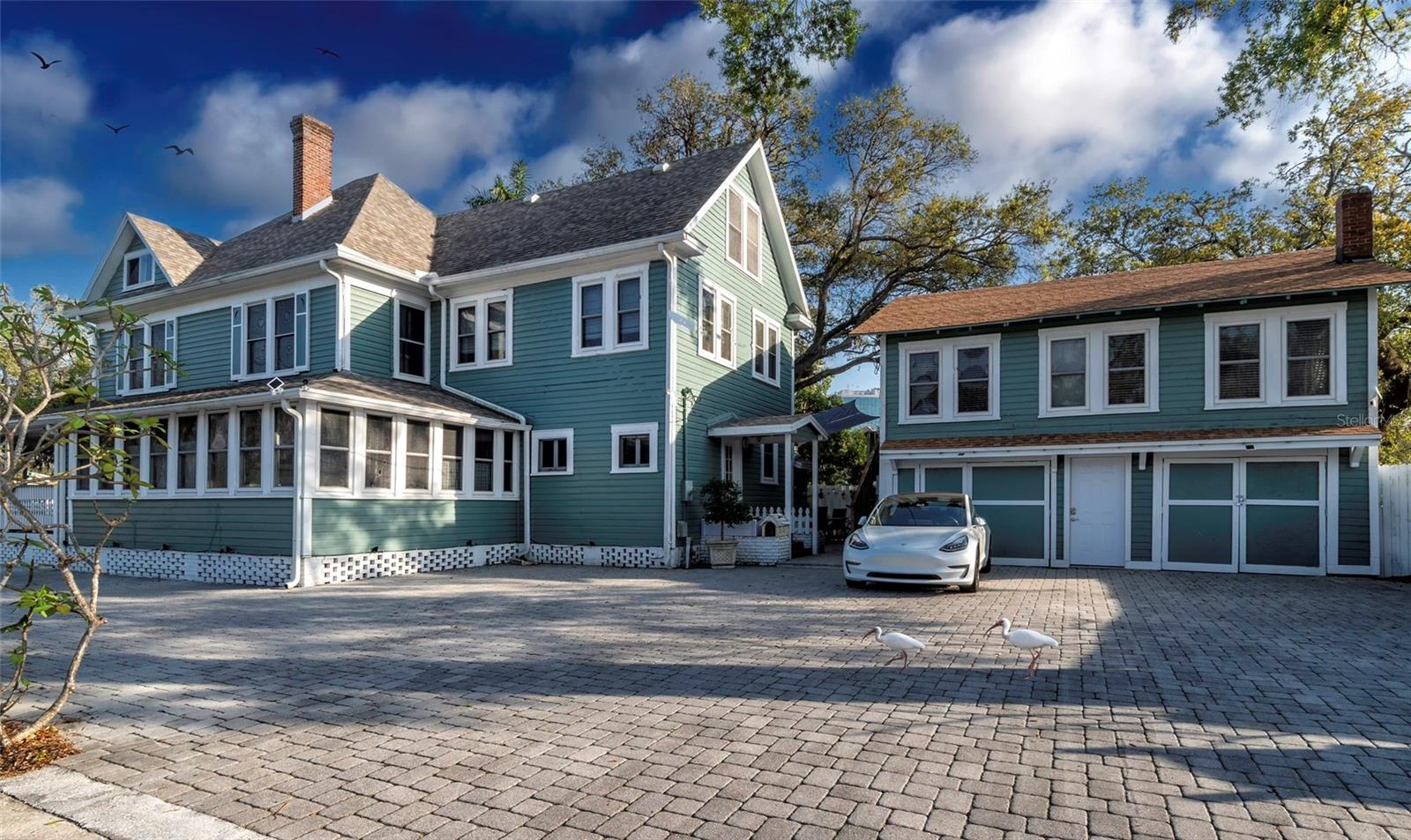 Step into a piece of Bradenton’s history with this beautifully restored 1920 Victorian home, once known as The Londoner Bed & Breakfast. Located in the heart of downtown, this one-of-a-kind property is the only home in the city officially classified as a Bed & Breakfast, offering unmatched flexibility and income potential. The versatile setup allows for multiple uses — live in it as a single-family residence with a detached mother-in-law suite, operate it as a traditional Bed & Breakfast, Wedding Venue, Office building or use it for short-term rentals and AirBnB stays. With the current zoning there are many potential uses in this downtown area. Rich in charm and character, the home showcases stunning woodwork, wrap-around porches, and timeless architectural details that reflect its storied past. With almost 5,000 square feet of living space designed for both comfort and hospitality, it’s perfect for an owner-operator, investor, or anyone seeking a property that combines lifestyle and income. This historic Bradenton landmark blends classic elegance with modern opportunity — ready to continue its legacy as one of the city’s most iconic homes.