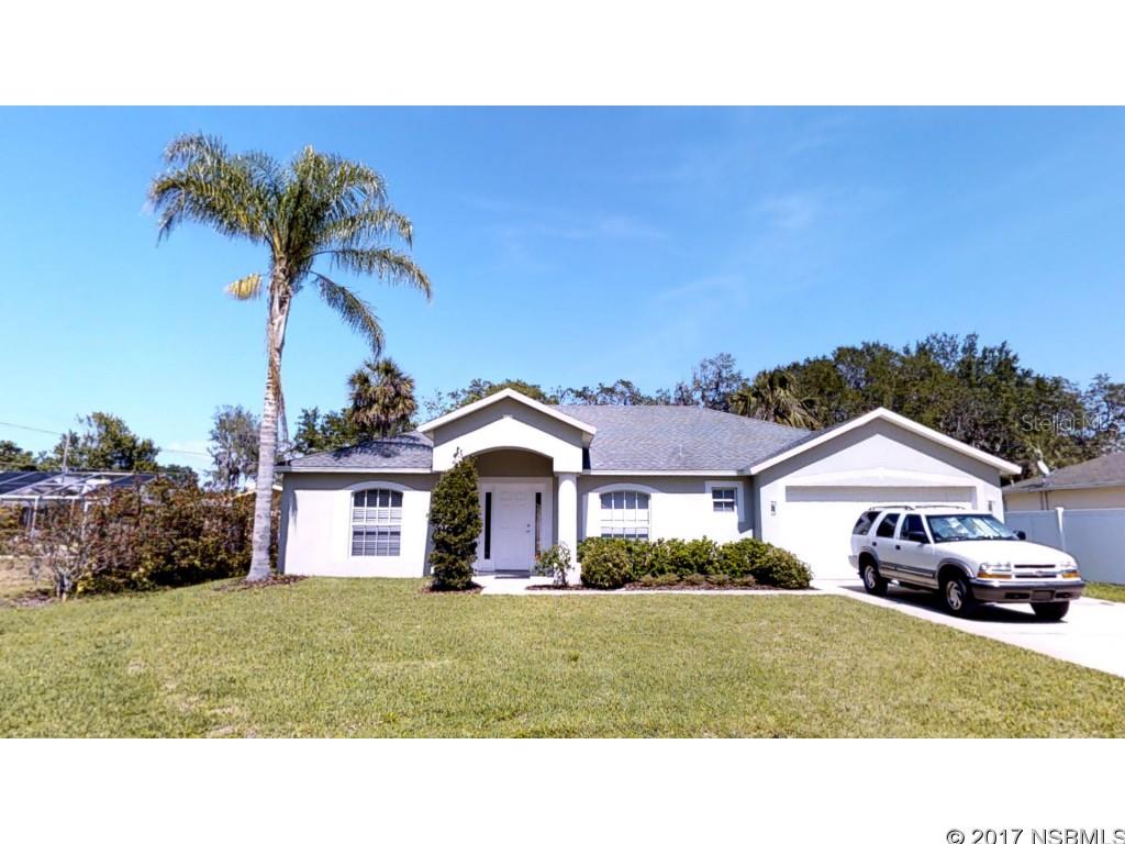 Back the moving van up and start unpacking!  Yes, with 2,000 square feet of living space, this meticulously maintained and recently updated home on a quite street with easy access to shopping, local boat ramps to the east, the Edgewater Trail & I-95 to the west is "move-in ready"! Featuring an open living and dining area in the front of the home and a spacious open family room and kitchen with eat-in area in the center of the home. This home is designed for entertaining and spreading out! Kitchen features an island/breakfast bar and a large pantry. The whole house has new flooring throughout... new carpet in the bedrooms & family room, and rich wood- plank laminate in the rest of the house. Lots of added features included with this home: hurricane panels, electronic garage door opener, irrigation system with timer, inside utility/laundry room. New A/C in 2013. Back yard is fenced on 3 sides, just needs a gate on one side to keep the pets in the yard! And speaking of yard, new St. Augustine sod was recently laid! Property is "high & dry" and does NOT need flood insurance as well as there are no HOA fees!  Bring the fishing boat, bikes, paddle boards, kayaks and golf clubs and start living the Florida dream! ;Water: City