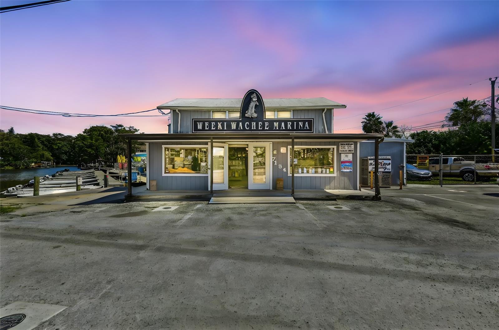 A once-in-a-lifetime chance to own a thriving waterfront business and property in the heart of Weeki Wachee Gardens, one of Florida’s most iconic natural spring destinations. Perfectly positioned on Shoal Line Road with direct access to the Weeki Wachee River, this multi-use property spans three waterfront parcels and has been family-owned for decades. Now available for the first time in generations, it presents a true turn-key business with multiple income streams and long-term value.
Direct access to the internationally known Weeki Wachee River, famous for its crystal-clear waters, manatees, dolphins, kayaking, boating, and eco-tourism. Very limited commercial availability makes this a rare find.

 Spacious retail building offering fishing and boating supplies, plus an on-site ice machine generating income.

Marine Services – Authorized Suzuki Service provider with established motor repair business. Includes a large enclosed service area with bay door and private office space.

Fuel Sales – Exclusive on-river fueling station.

Rental Operations – Income from jon boat rentals, kayak and paddleboard rentals, dock space for commercial vessels, and private vessel storage.

Residential Quarters – Upstairs living space above the retail store, perfect for a live-in manager or potential Airbnb rental.

Experienced Staff – Long-standing team in place for service and repair operations, ensuring a seamless transition.

Expansion Potential – Multi-use flexibility provides opportunities for additional income or new ventures.


Three waterfront lots, including a large building with residential space above.

Diverse income sources: retail, fuel, service, rentals, and storage.

Surrounded by Airbnb rentals, Weeki Wachee Preserve, Rogers Park, and just minutes to Hernando Beach and the Gulf.

Prime visibility and exposure with only one road in and out.

This is a unique chance to acquire a well-established waterfront business with irreplaceable real estate on the Weeki Wachee River. Whether you continue the proven operations or reimagine the space, the potential here is unmatched.